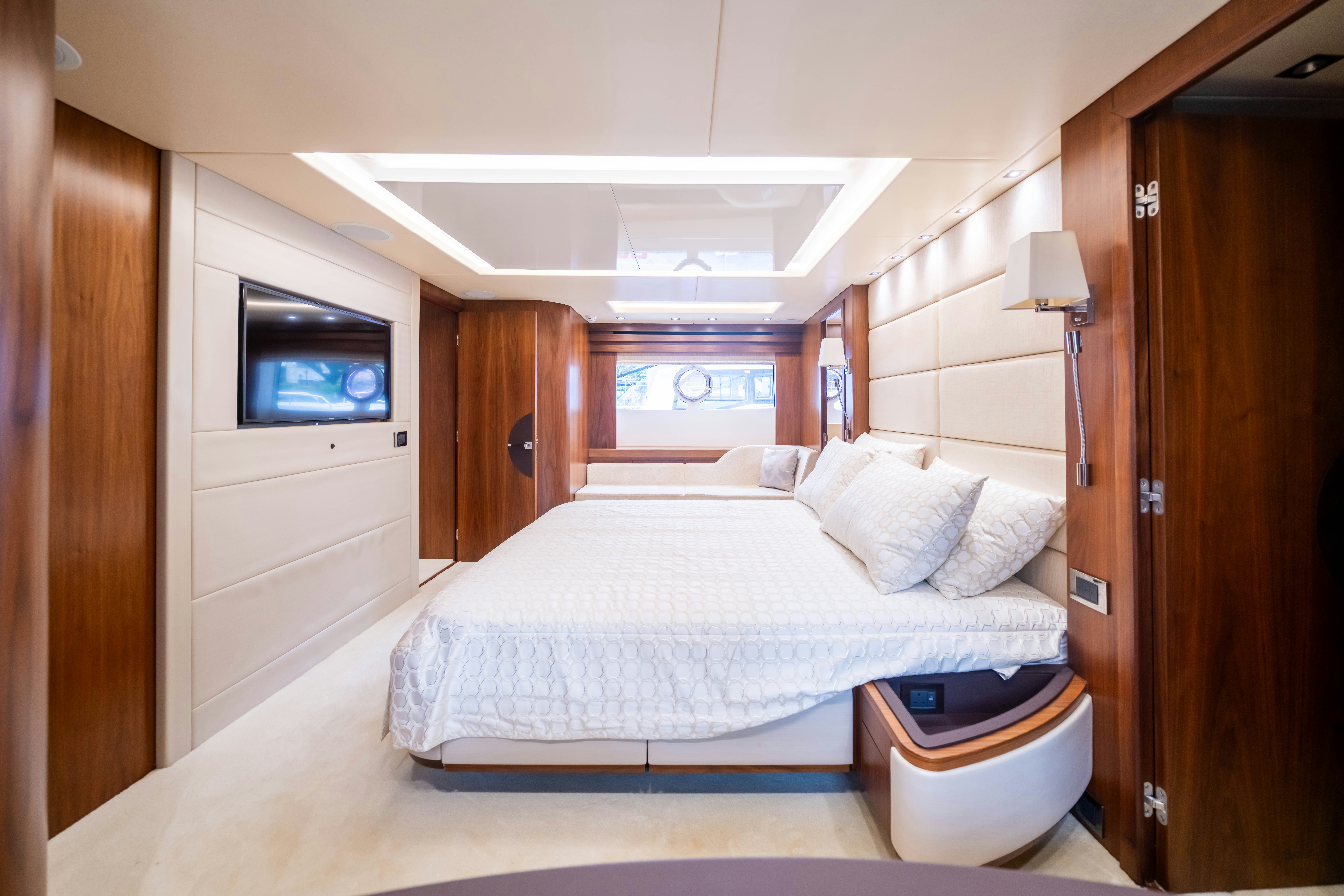 a bed in a room aboard DRAGON Yacht for Sale