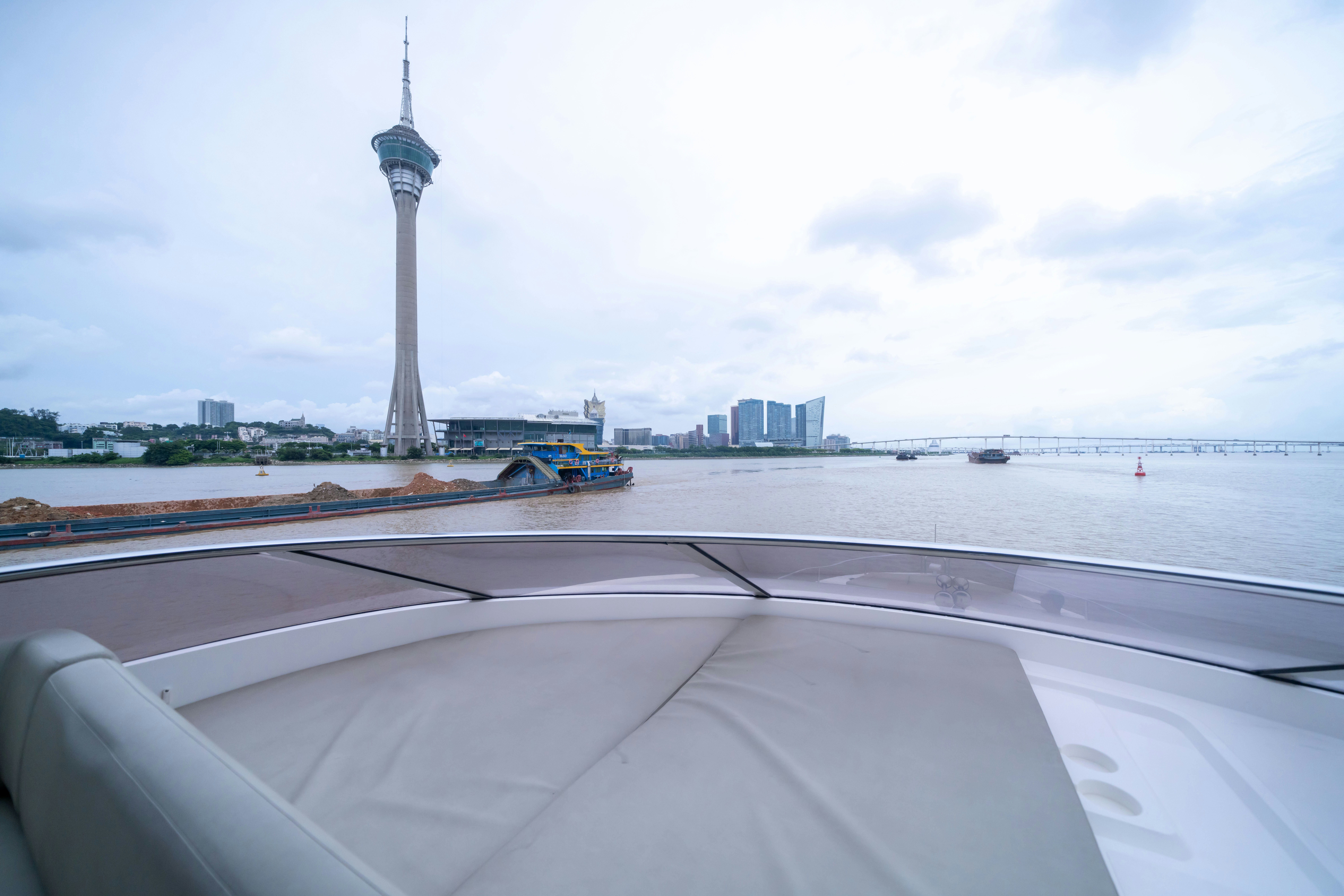 a view of a tower from a boat on a river aboard DRAGON Yacht for Sale