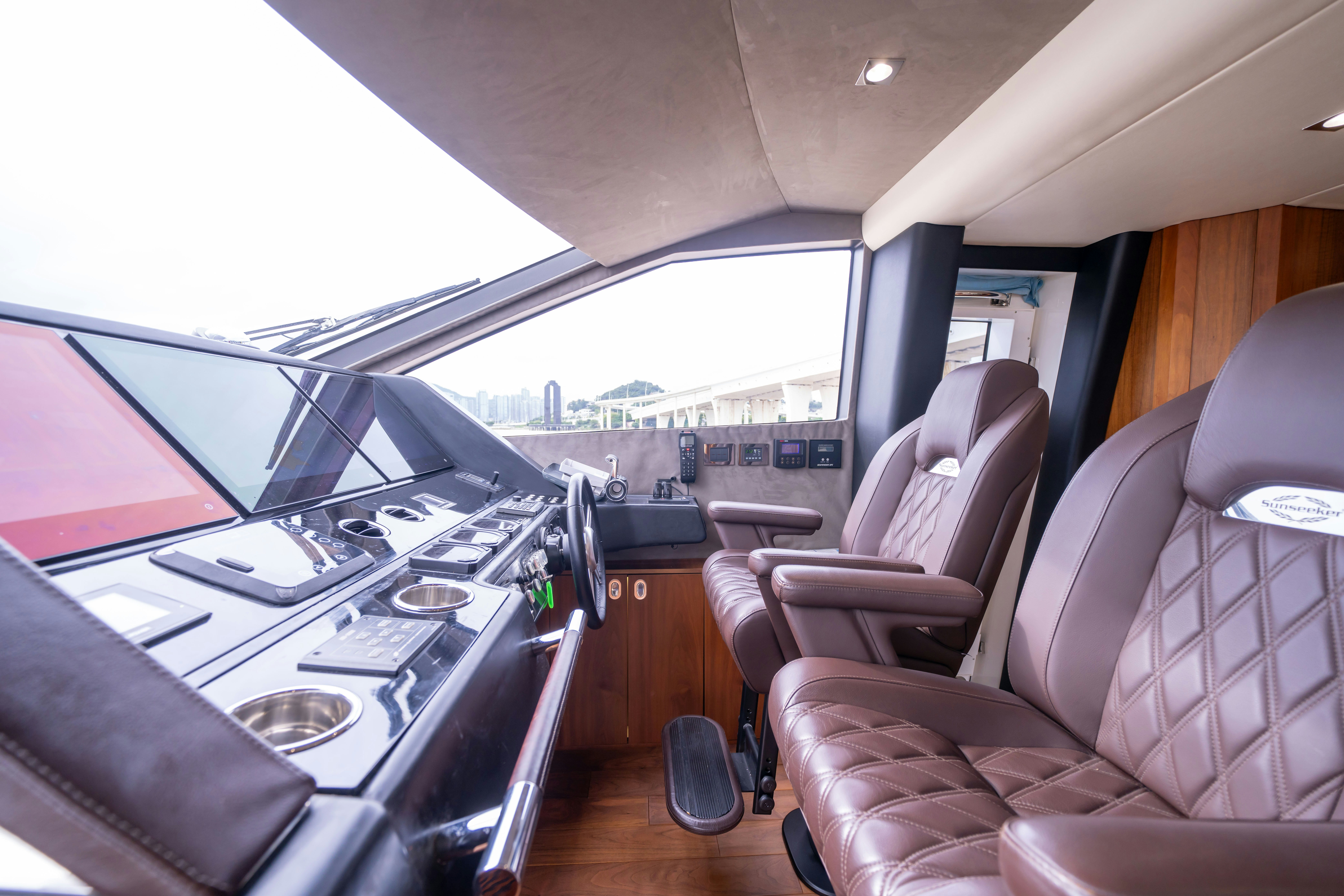 inside of a car aboard DRAGON Yacht for Sale