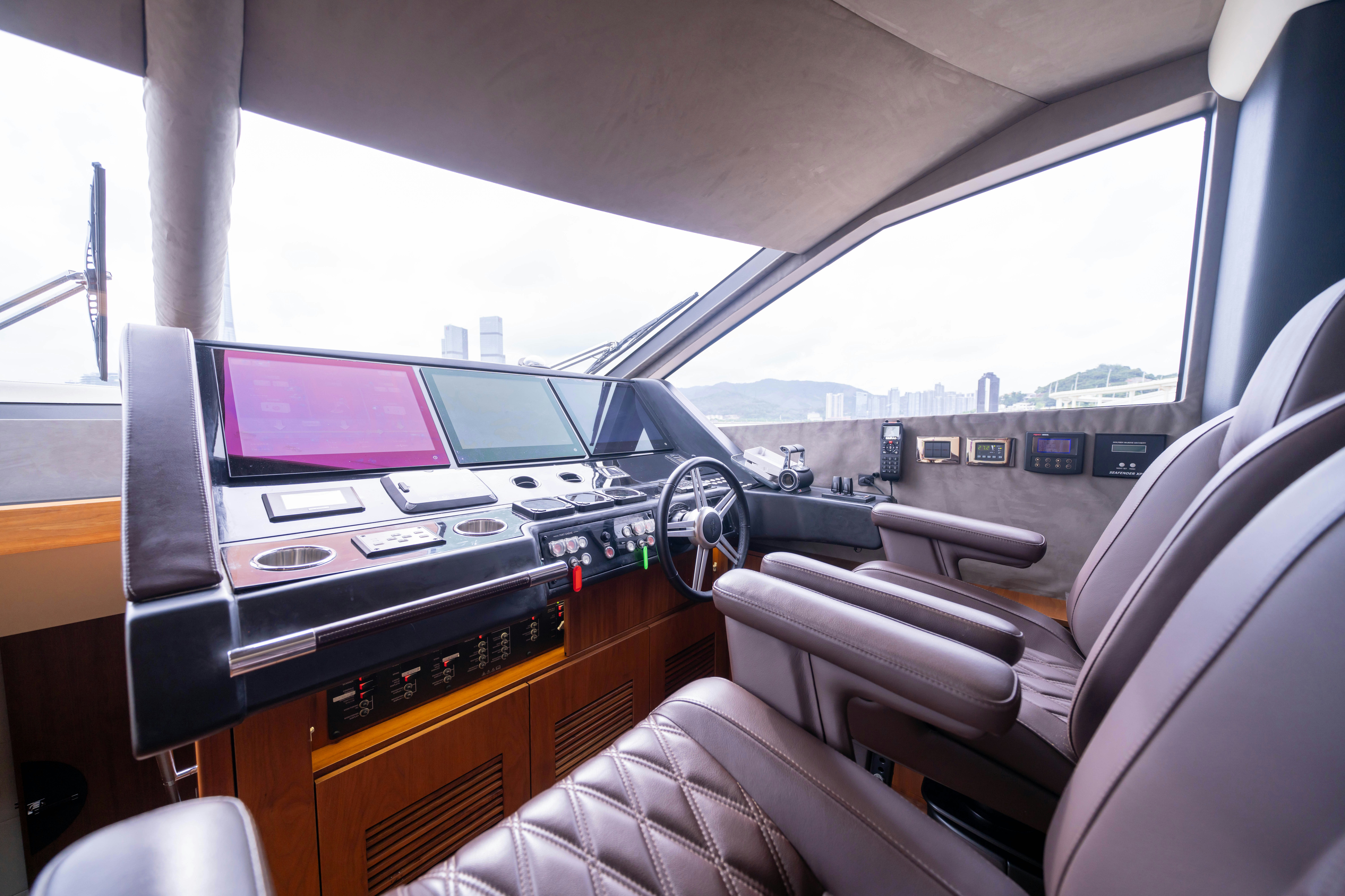 inside of a car aboard DRAGON Yacht for Sale