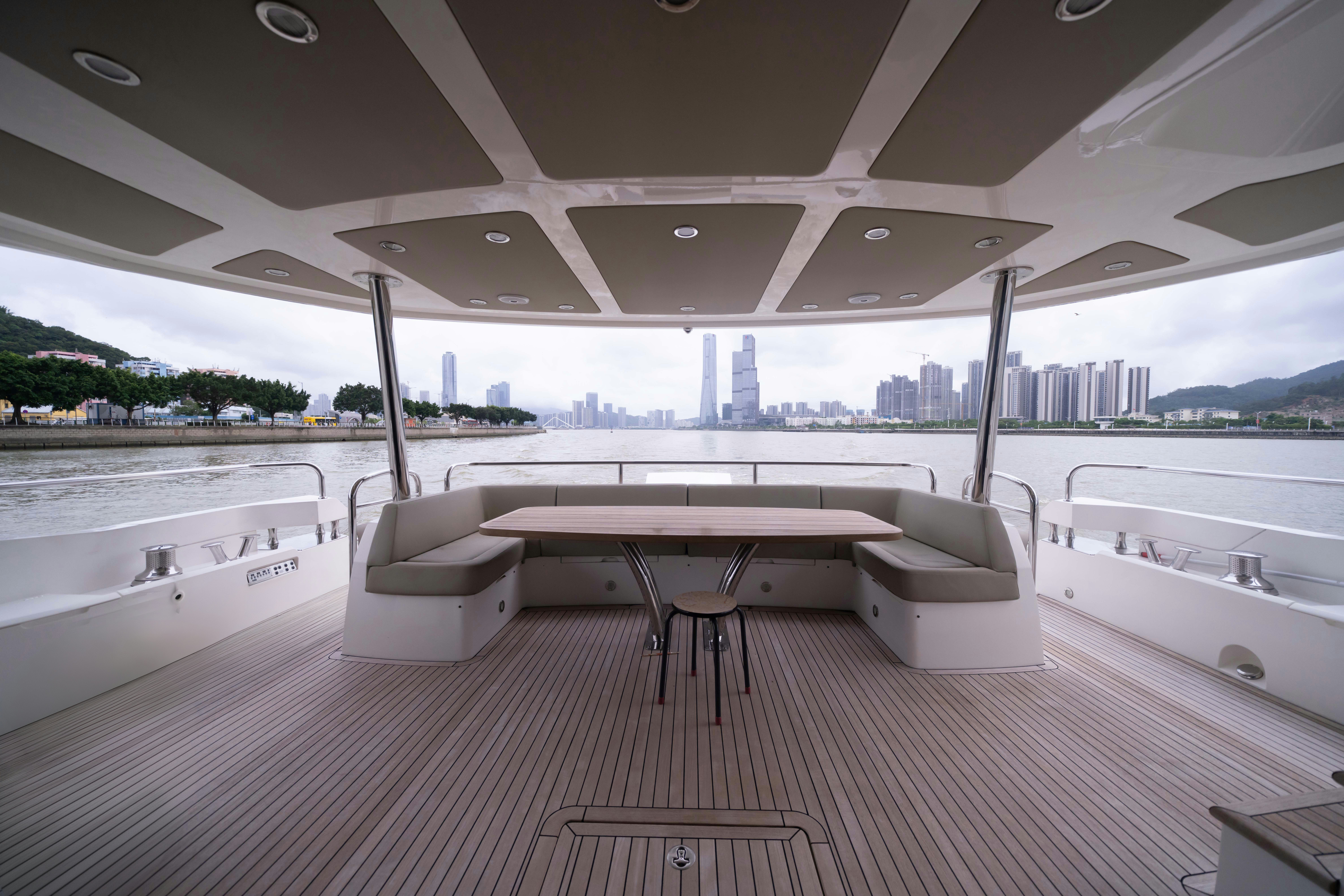 a boat on a water body aboard DRAGON Yacht for Sale