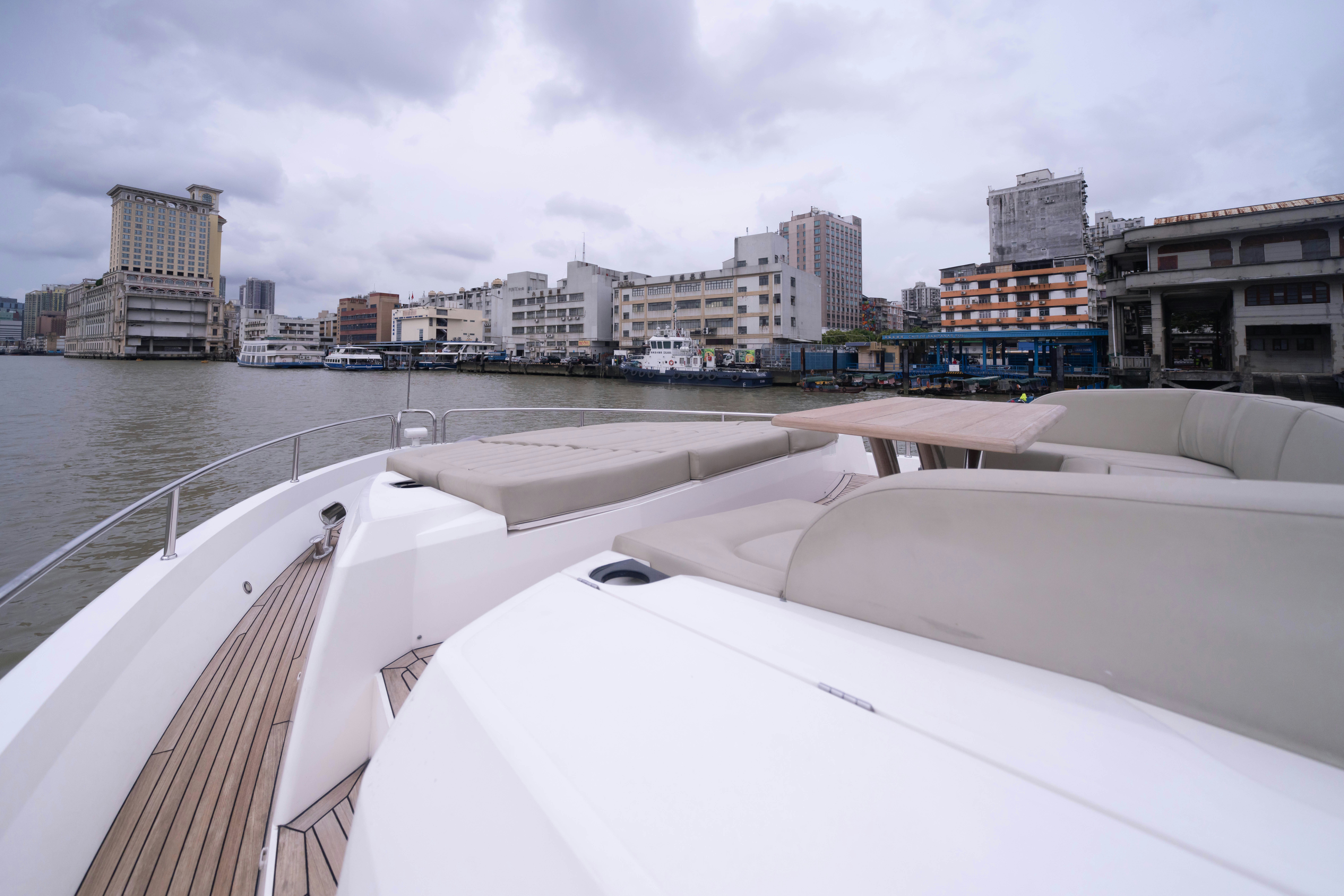a rooftop view of a city aboard DRAGON Yacht for Sale