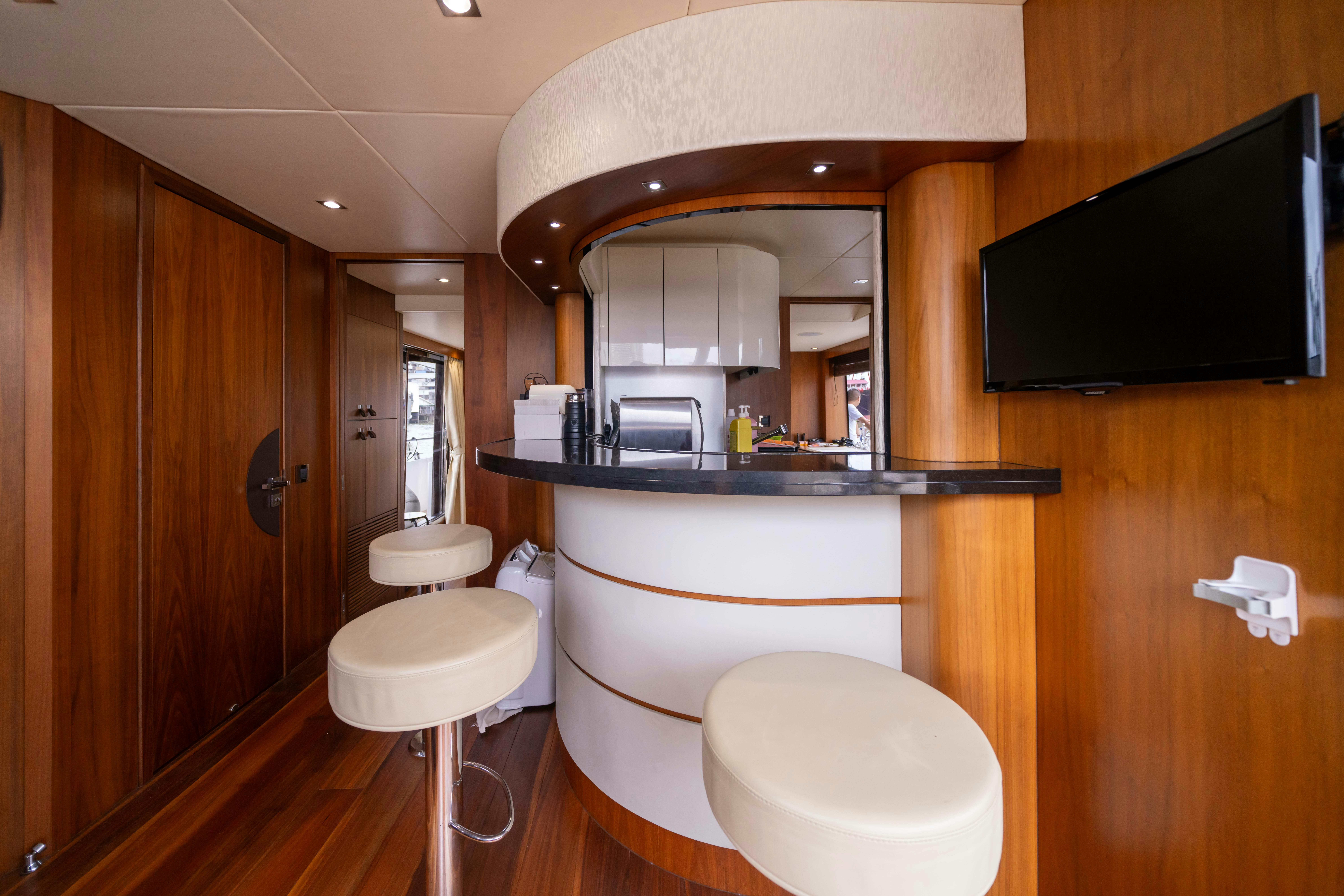a bathroom with a large mirror aboard DRAGON Yacht for Sale