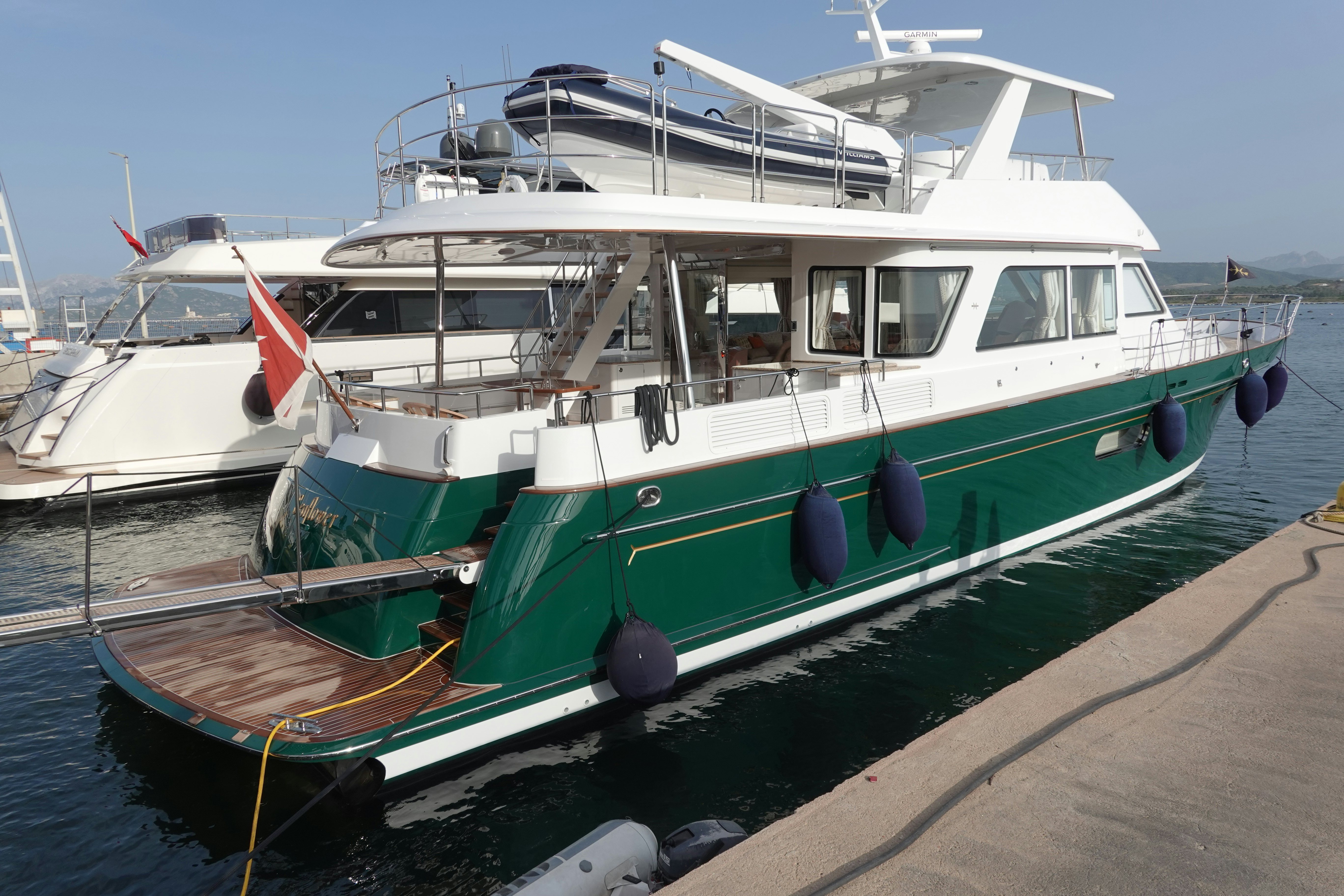 boats docked at a pier aboard FRIVOLOUS Yacht for Sale
