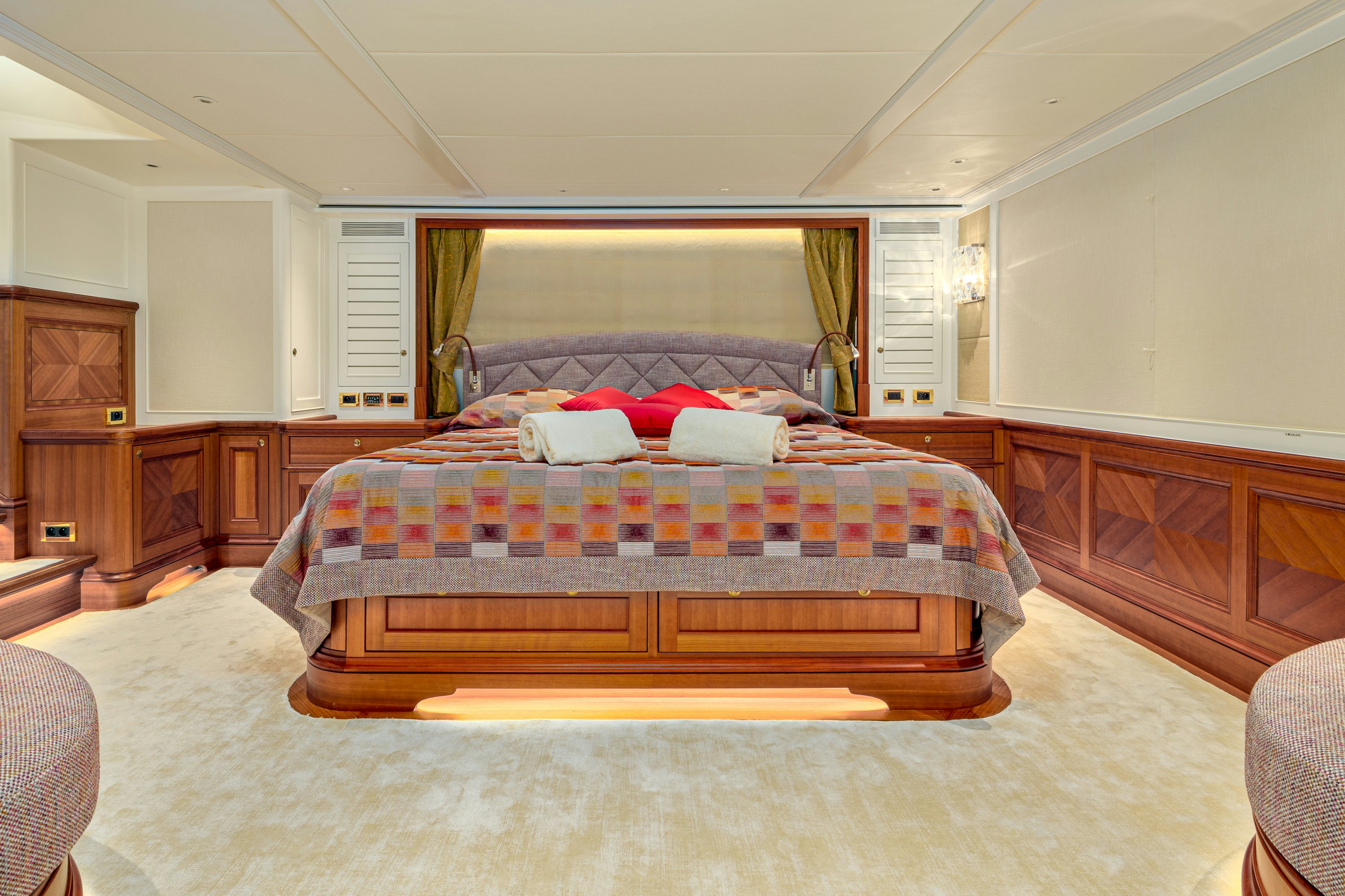 a bed in a room aboard FRIVOLOUS Yacht for Sale