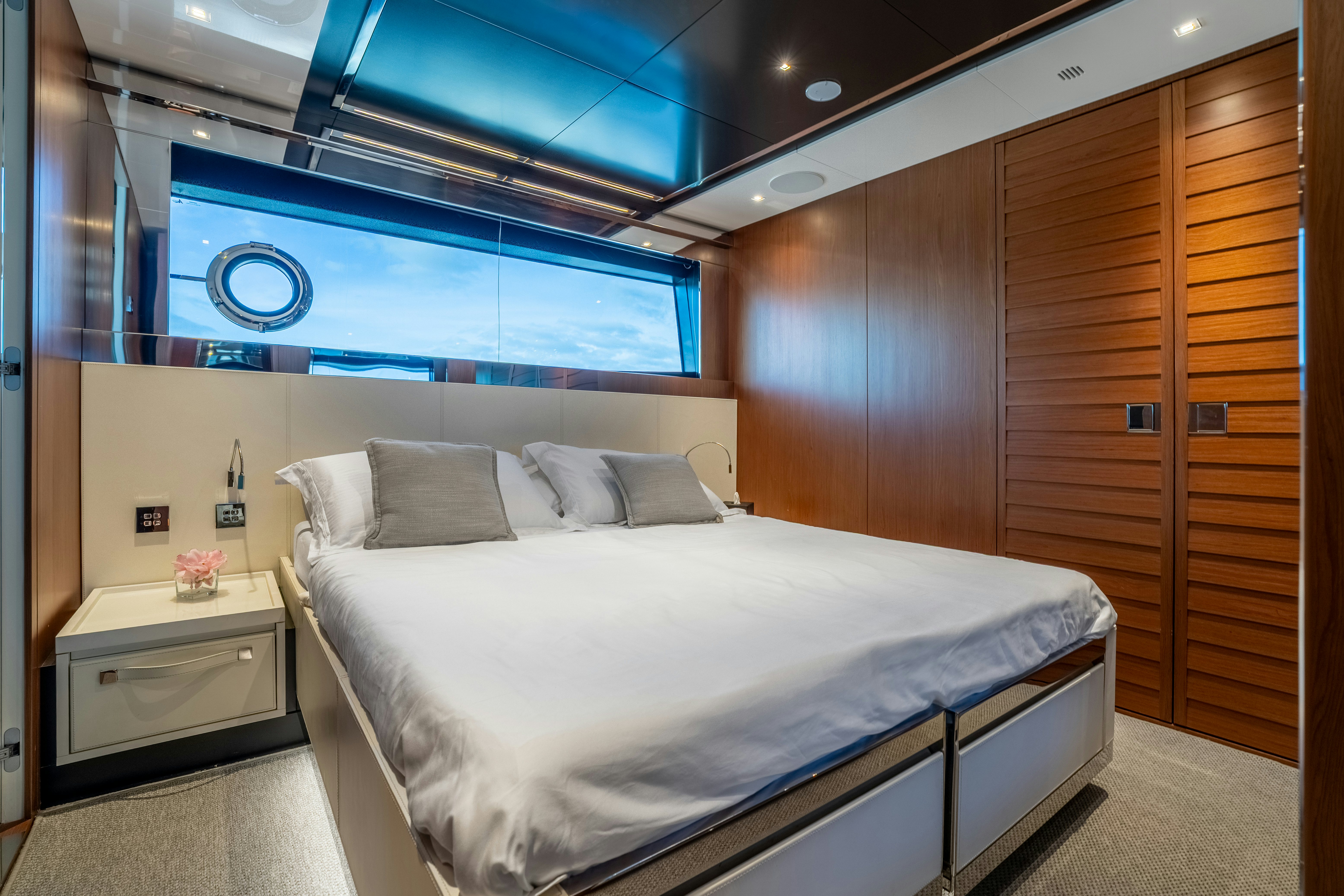 a bed in a room aboard NOI Yacht for Sale