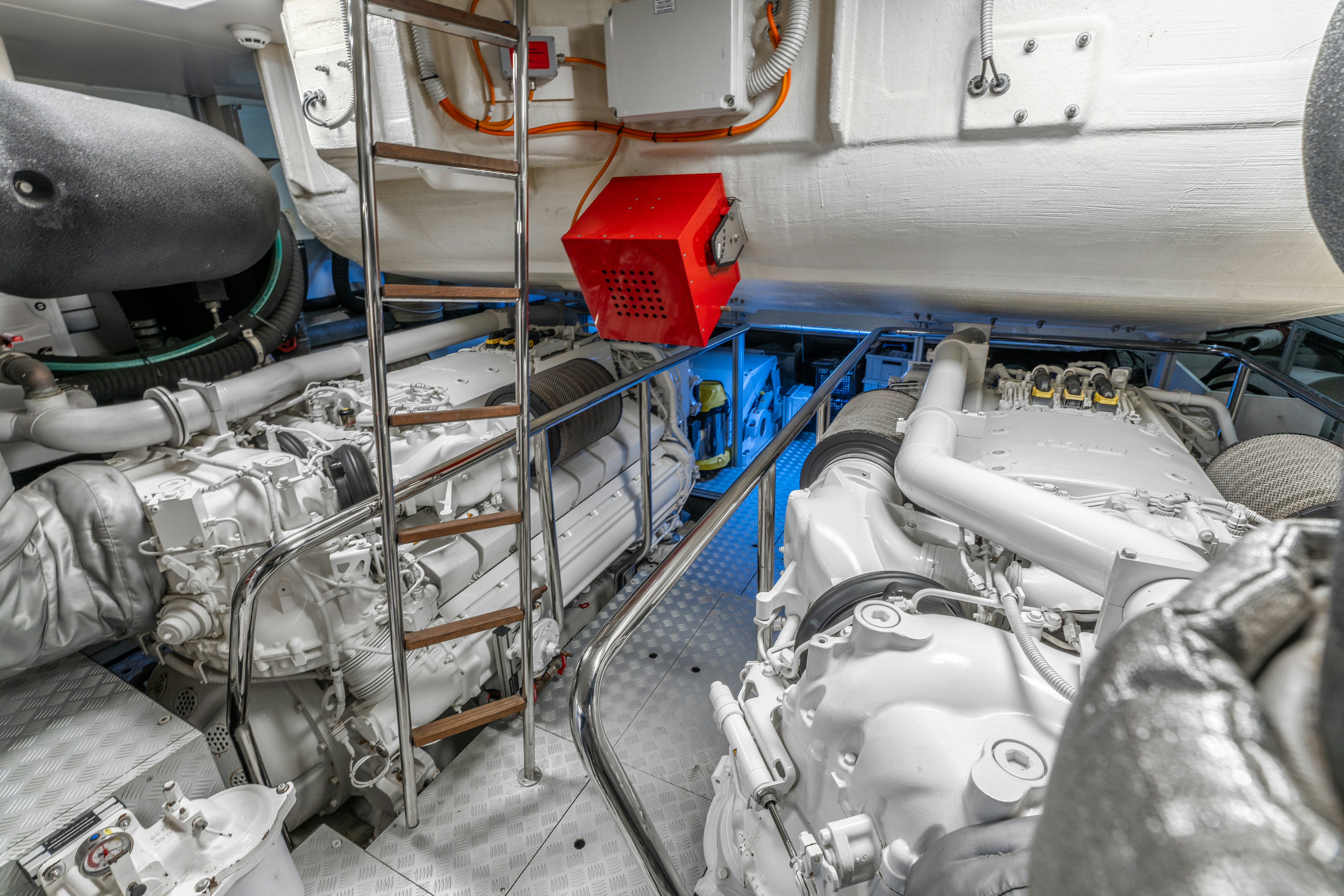 a machine with a red container aboard NOI Yacht for Sale