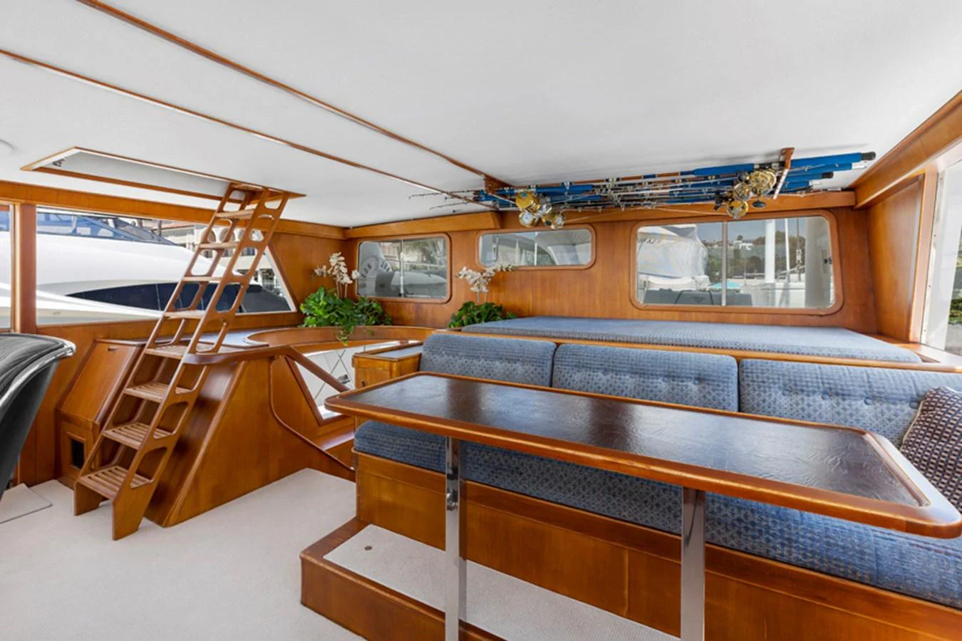 a room with a bench and a set of stairs aboard DON JUAN Yacht for Sale