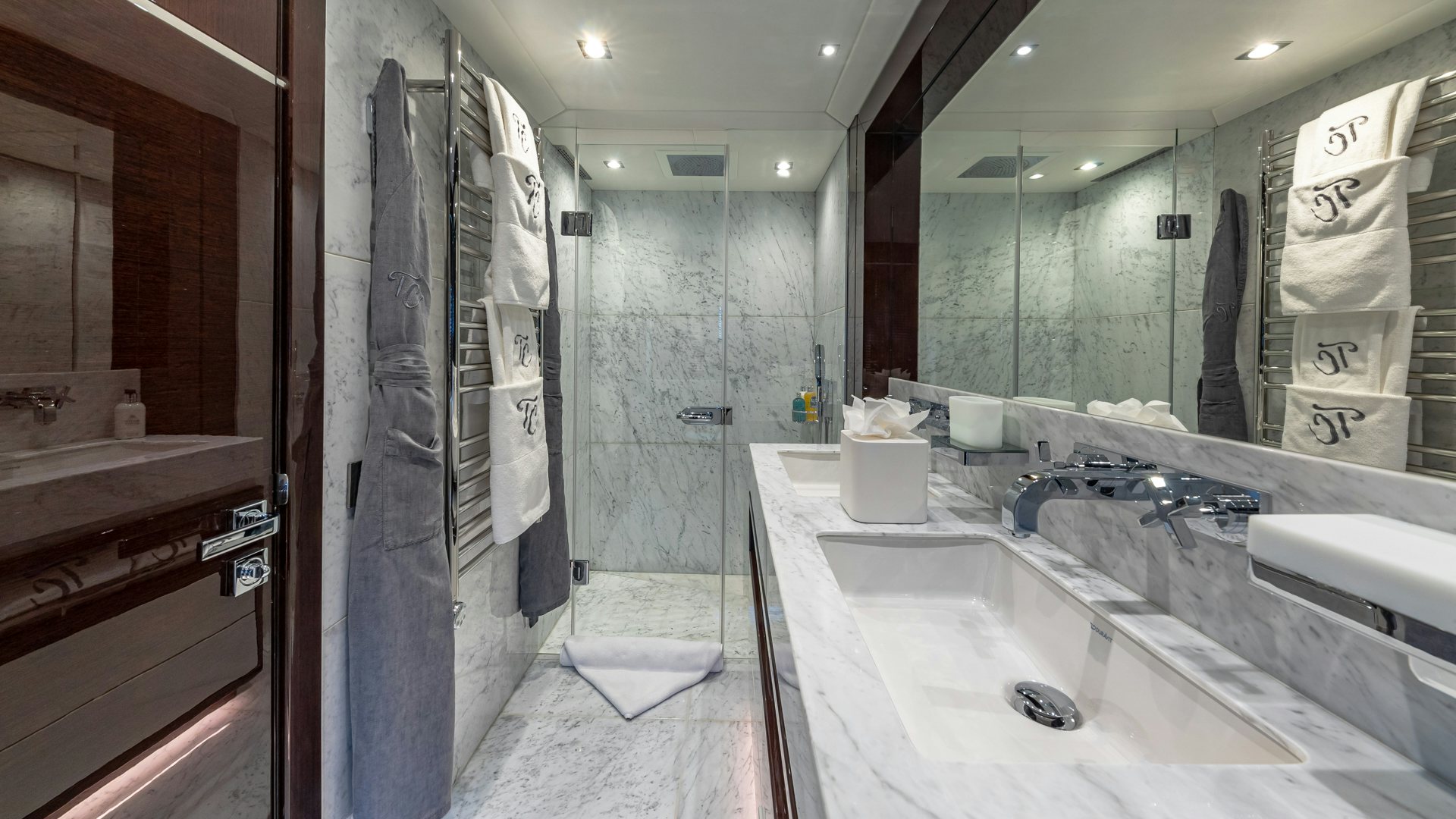 a bathroom with a large shower aboard CAPTAIN MORGAN III Yacht for Charter