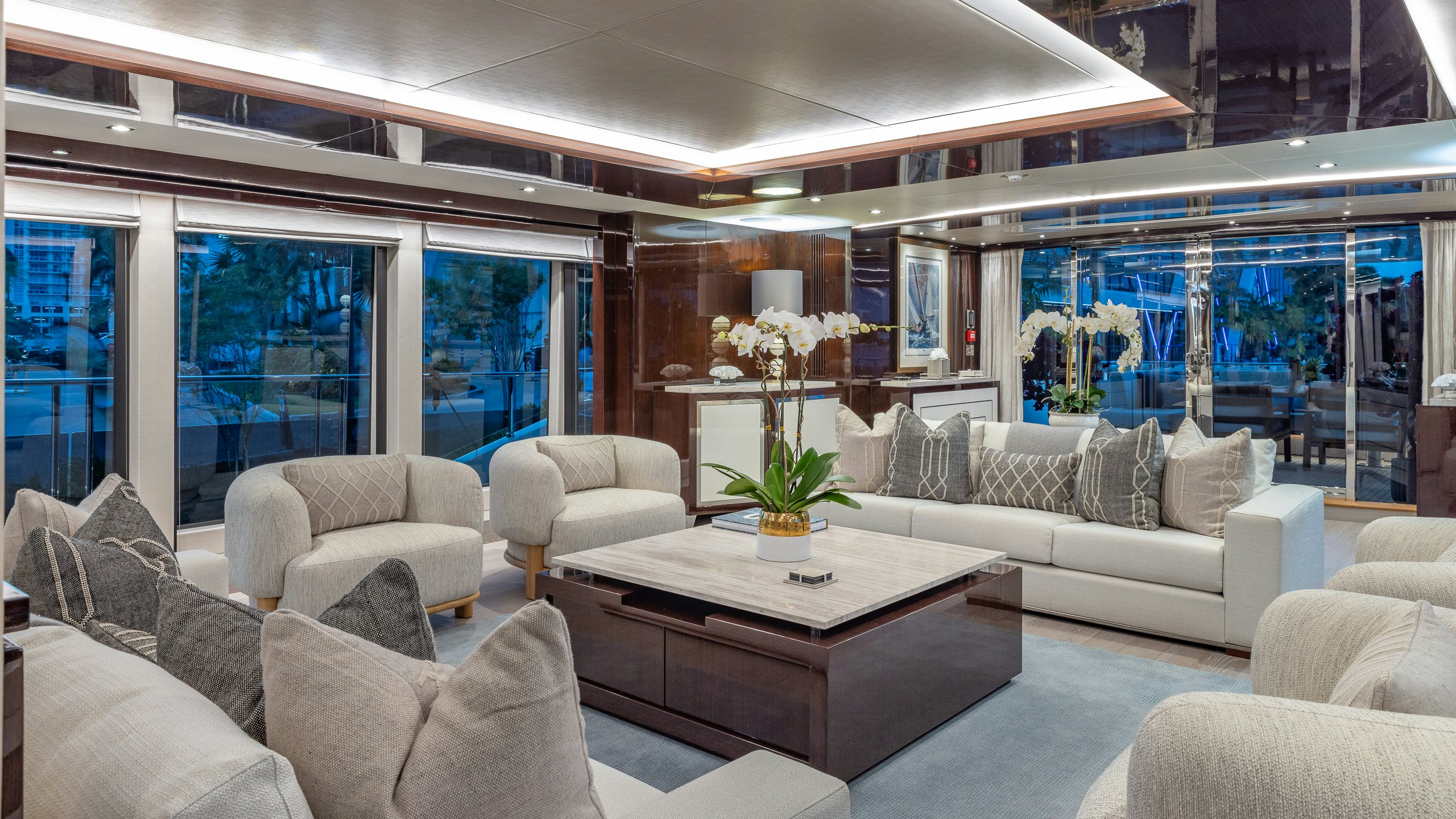a living room with a large window aboard CAPTAIN MORGAN III Yacht for Charter