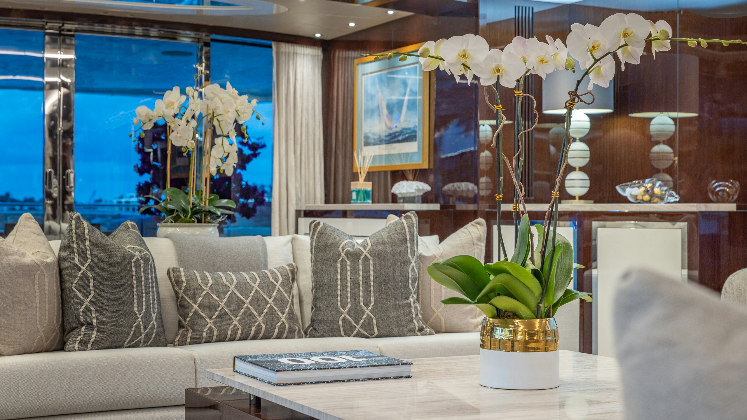 a living room with a large window aboard CAPTAIN MORGAN III Yacht for Charter
