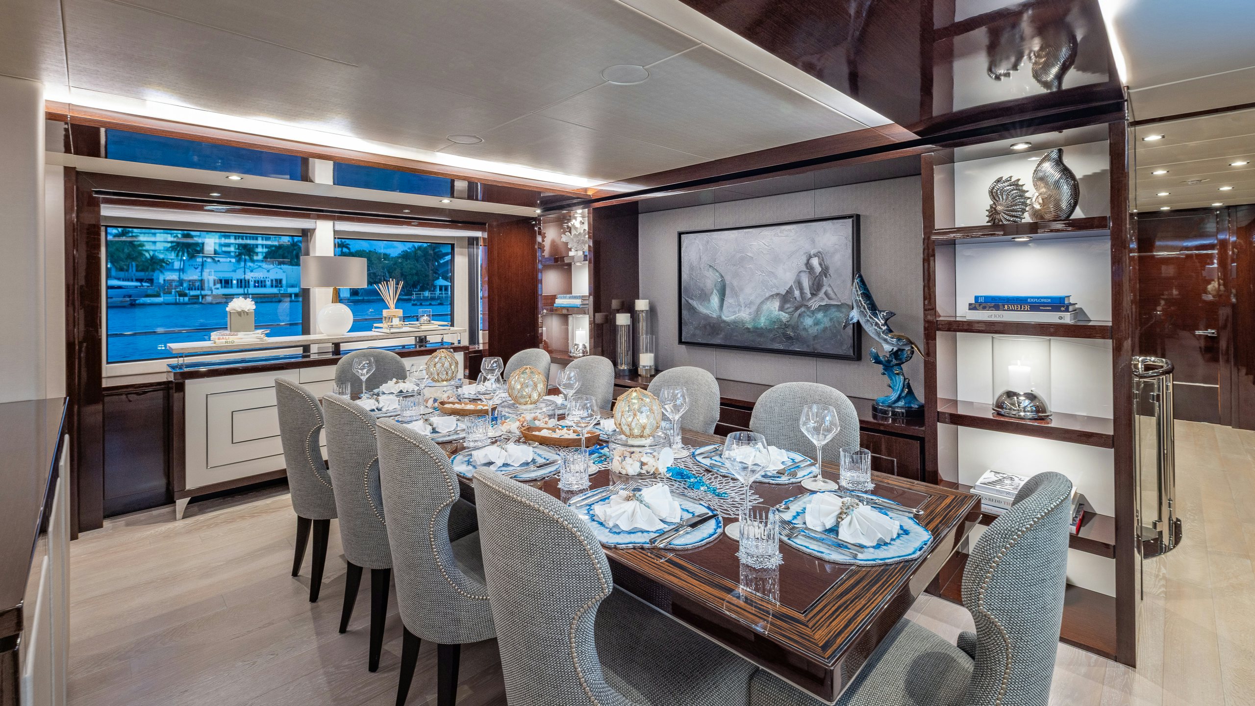 a dining room with a large table aboard CAPTAIN MORGAN III Yacht for Charter