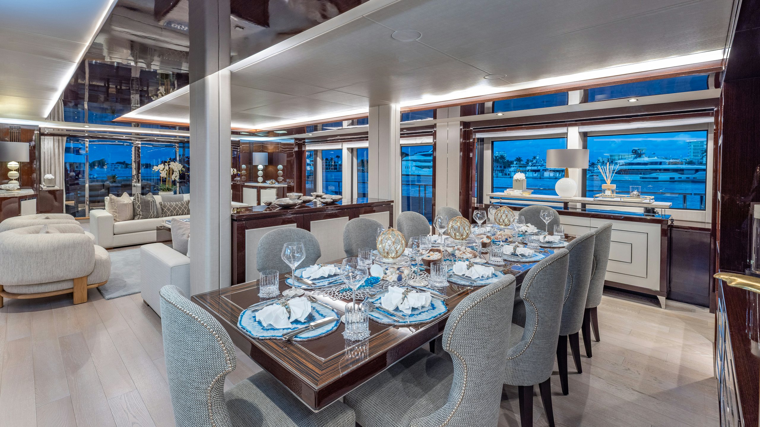 a dining room with a large table aboard CAPTAIN MORGAN III Yacht for Charter