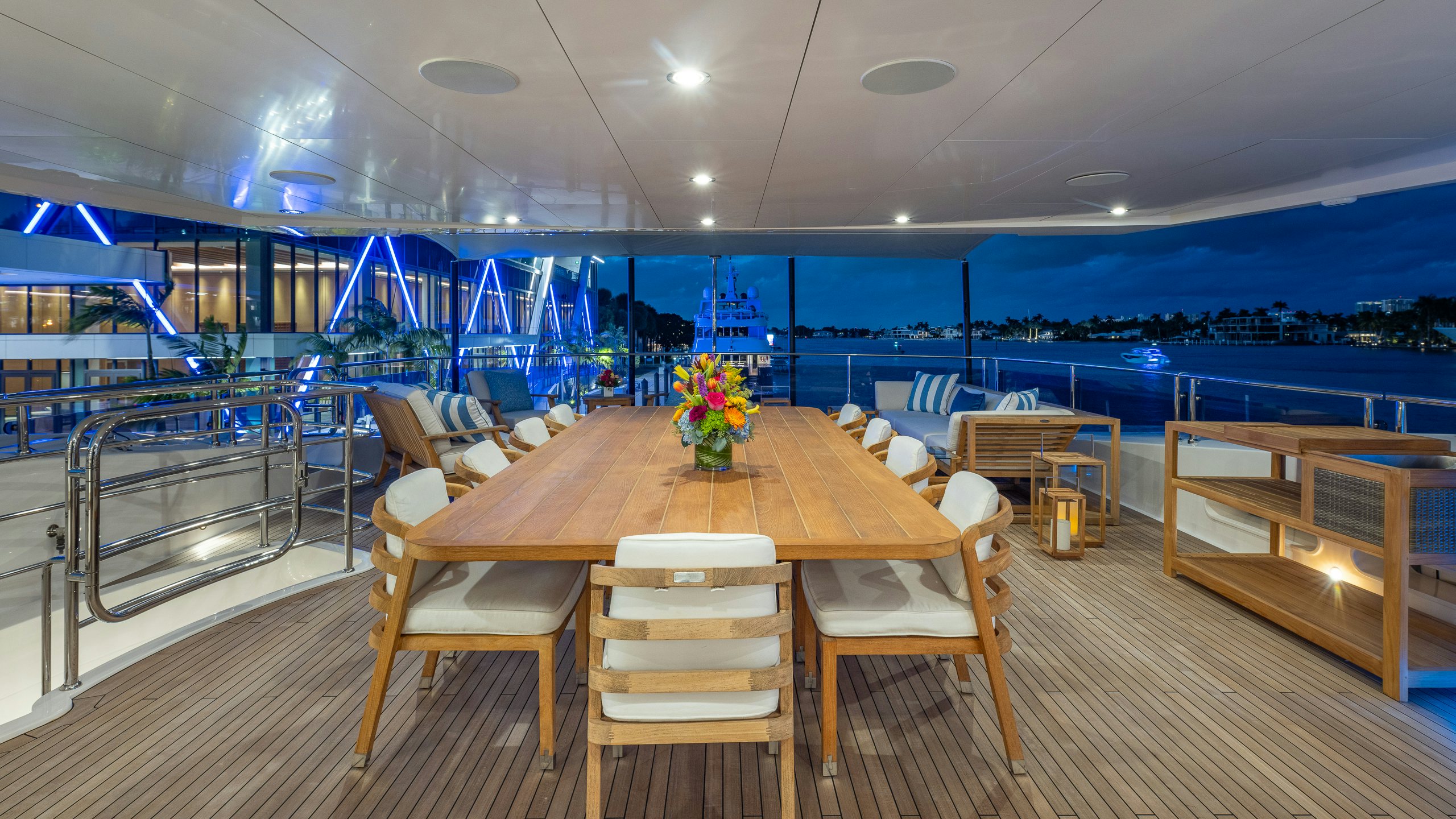 a large room with tables and chairs aboard CAPTAIN MORGAN III Yacht for Charter