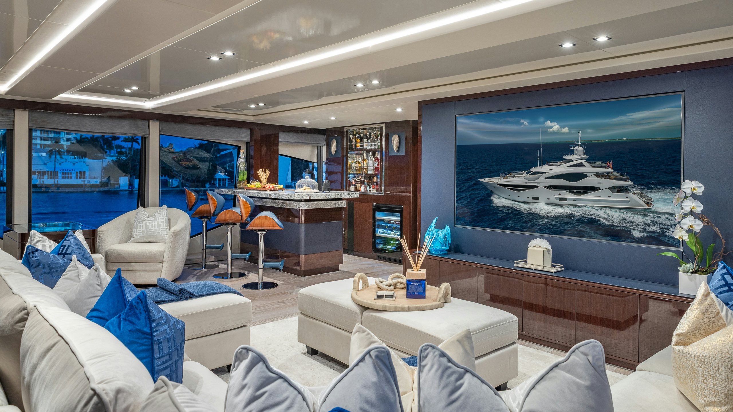 a room with a large screen aboard CAPTAIN MORGAN III Yacht for Charter