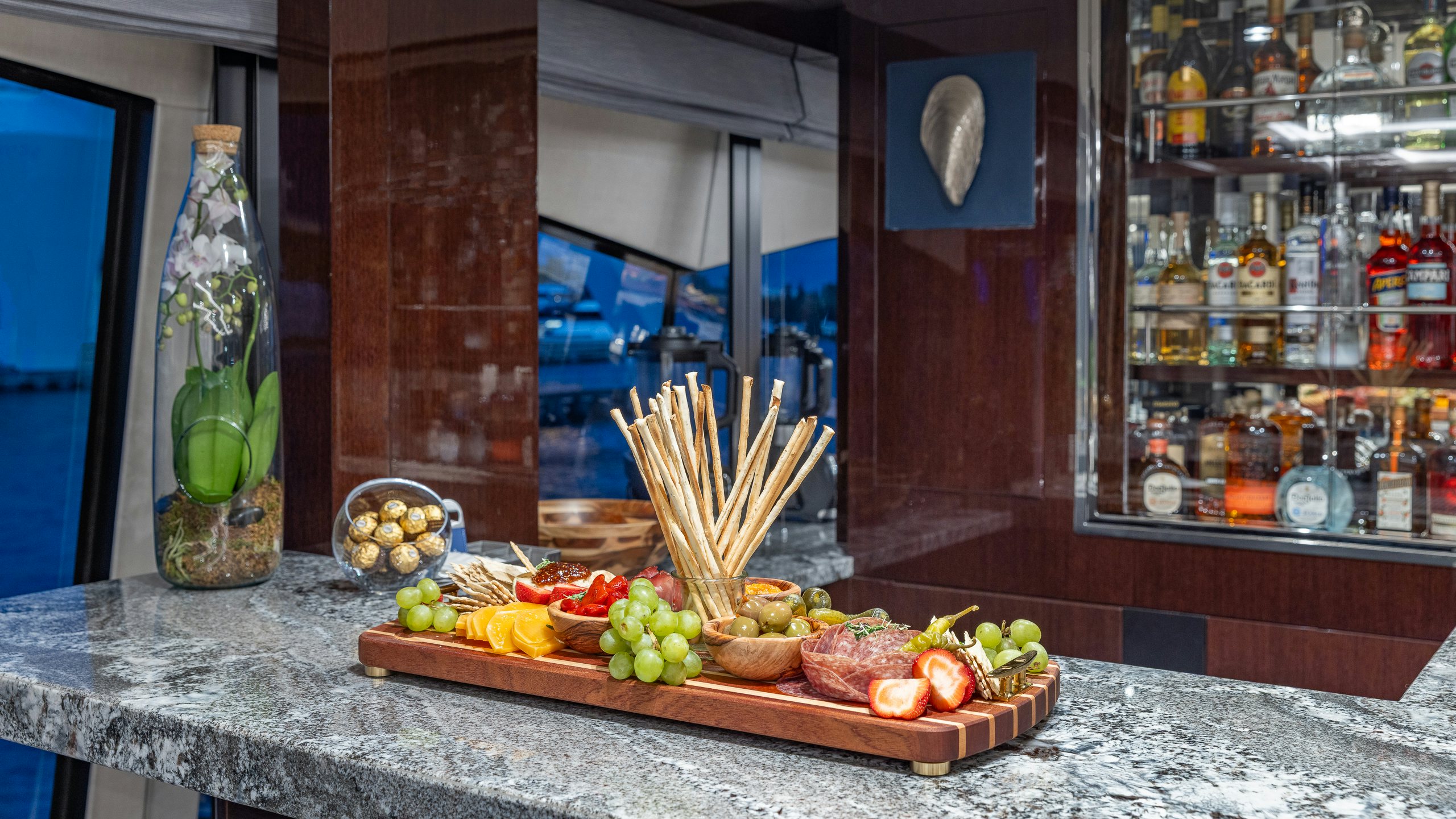 a table with food on it aboard CAPTAIN MORGAN III Yacht for Charter