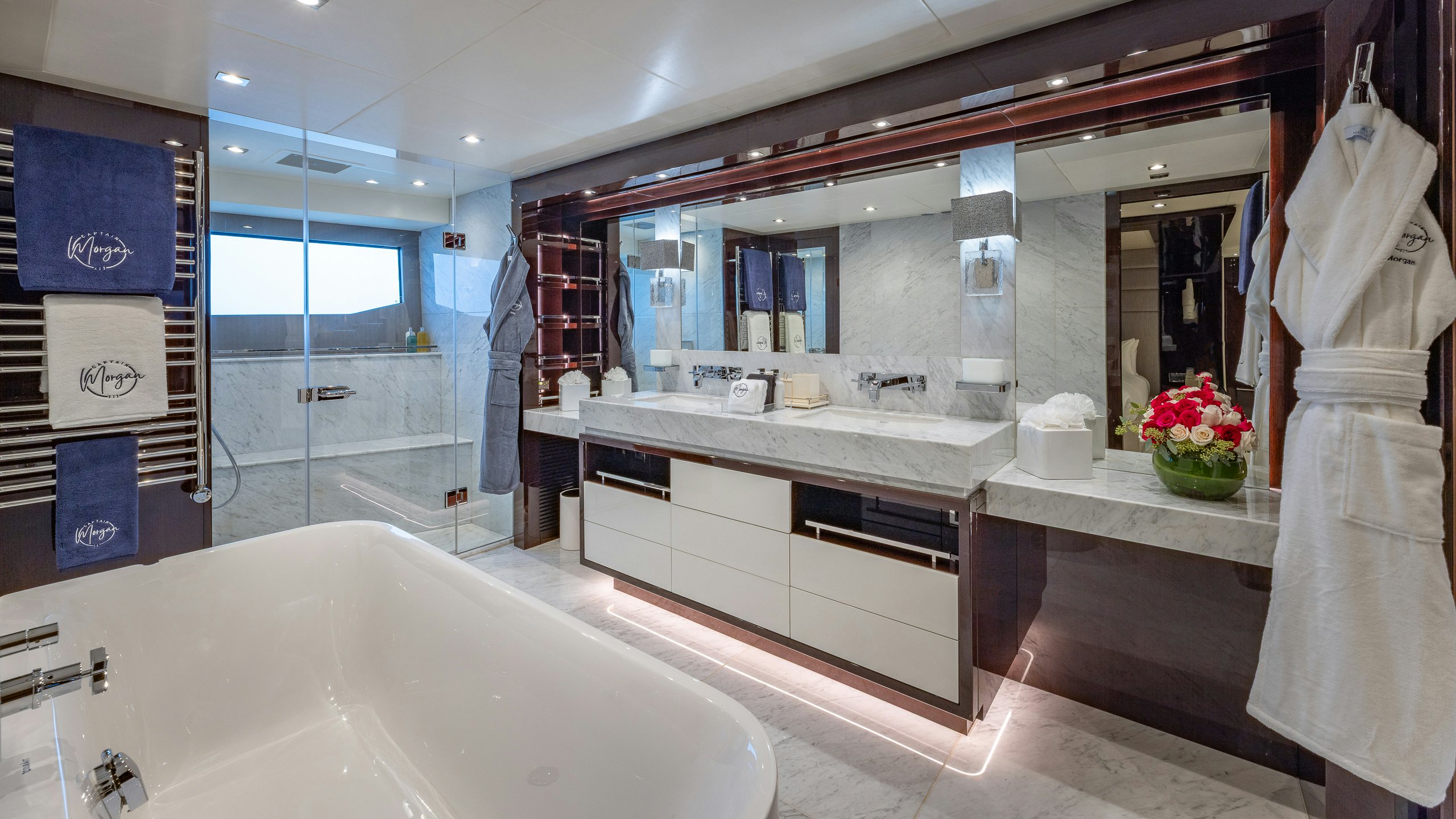 a bathroom with a large tub aboard CAPTAIN MORGAN III Yacht for Charter
