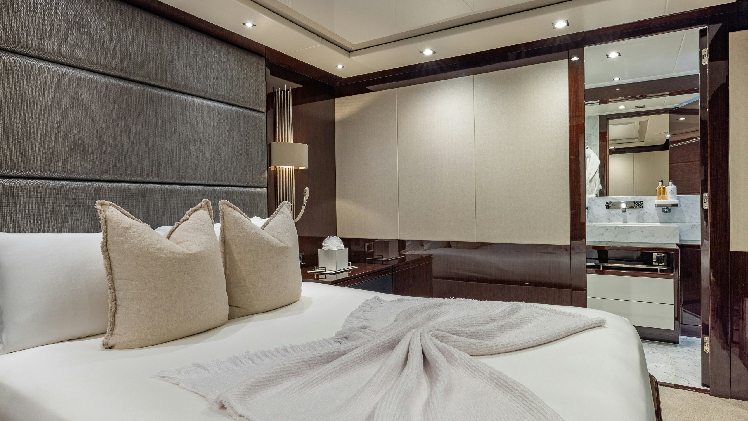 a bed in a room aboard CAPTAIN MORGAN III Yacht for Charter