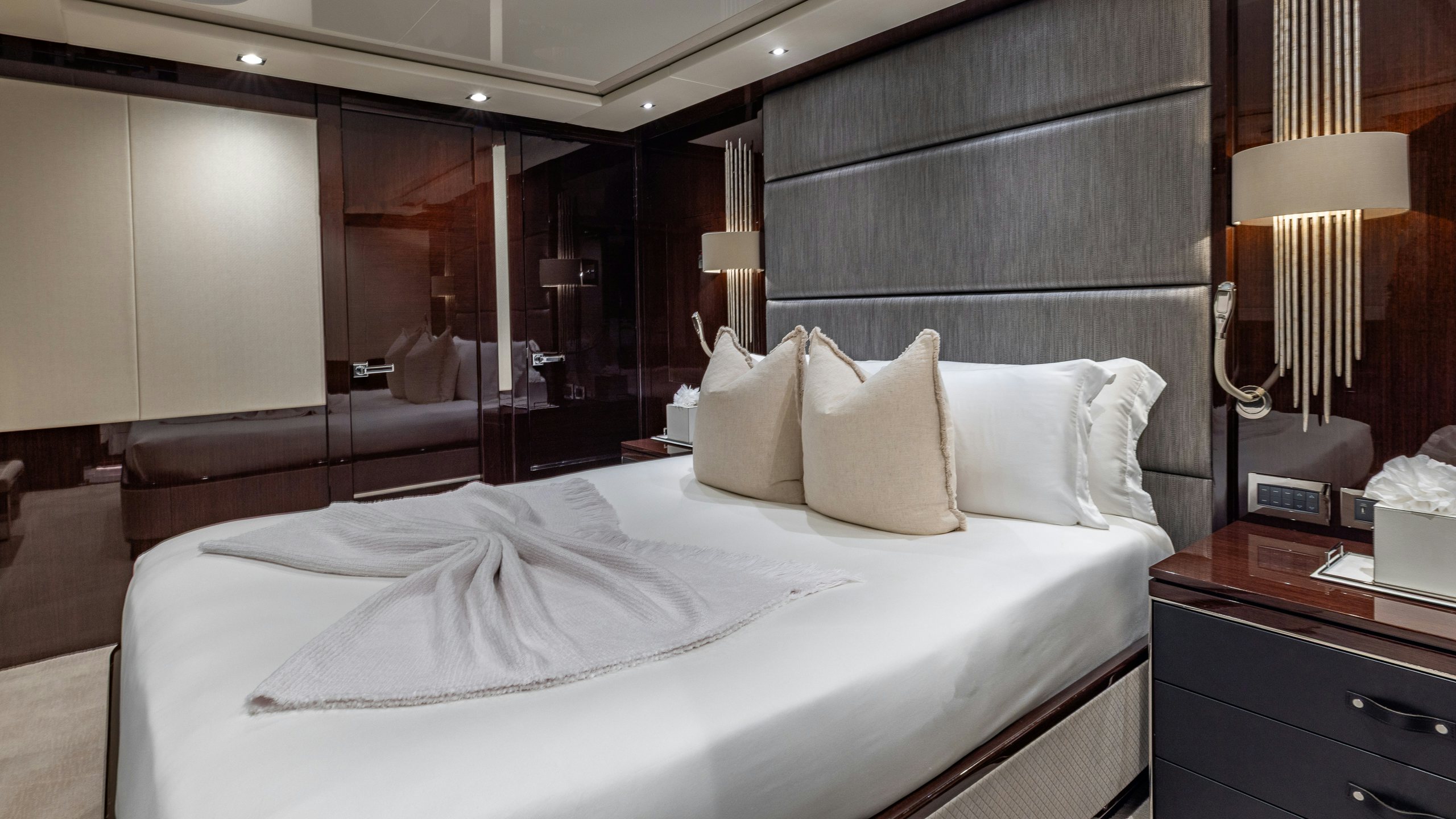 a hotel room with a bed aboard CAPTAIN MORGAN III Yacht for Charter