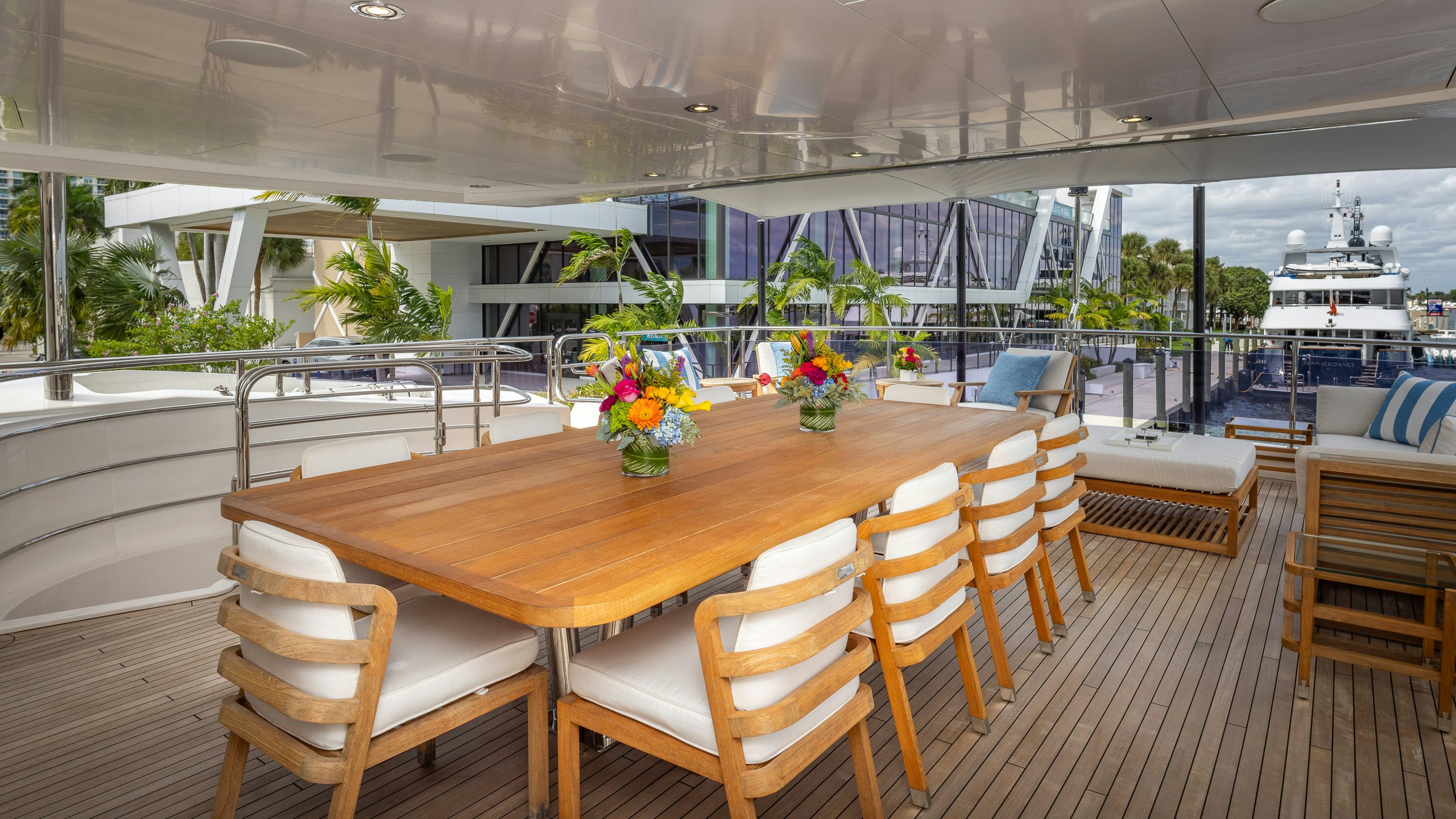 a table with chairs around it aboard CAPTAIN MORGAN III Yacht for Charter