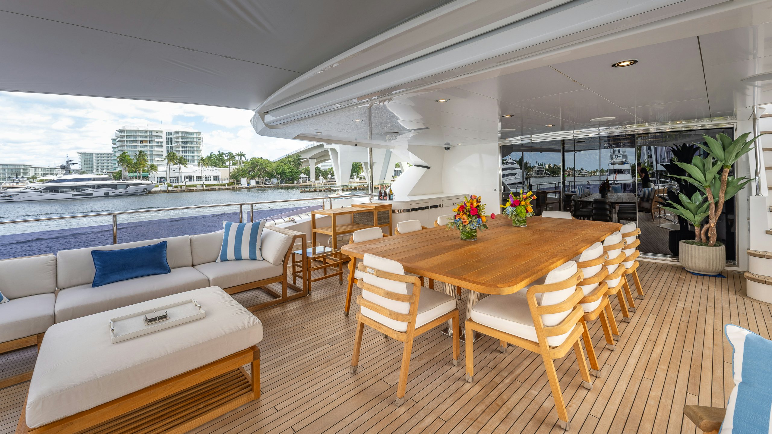 a room with a table and chairs aboard CAPTAIN MORGAN III Yacht for Charter
