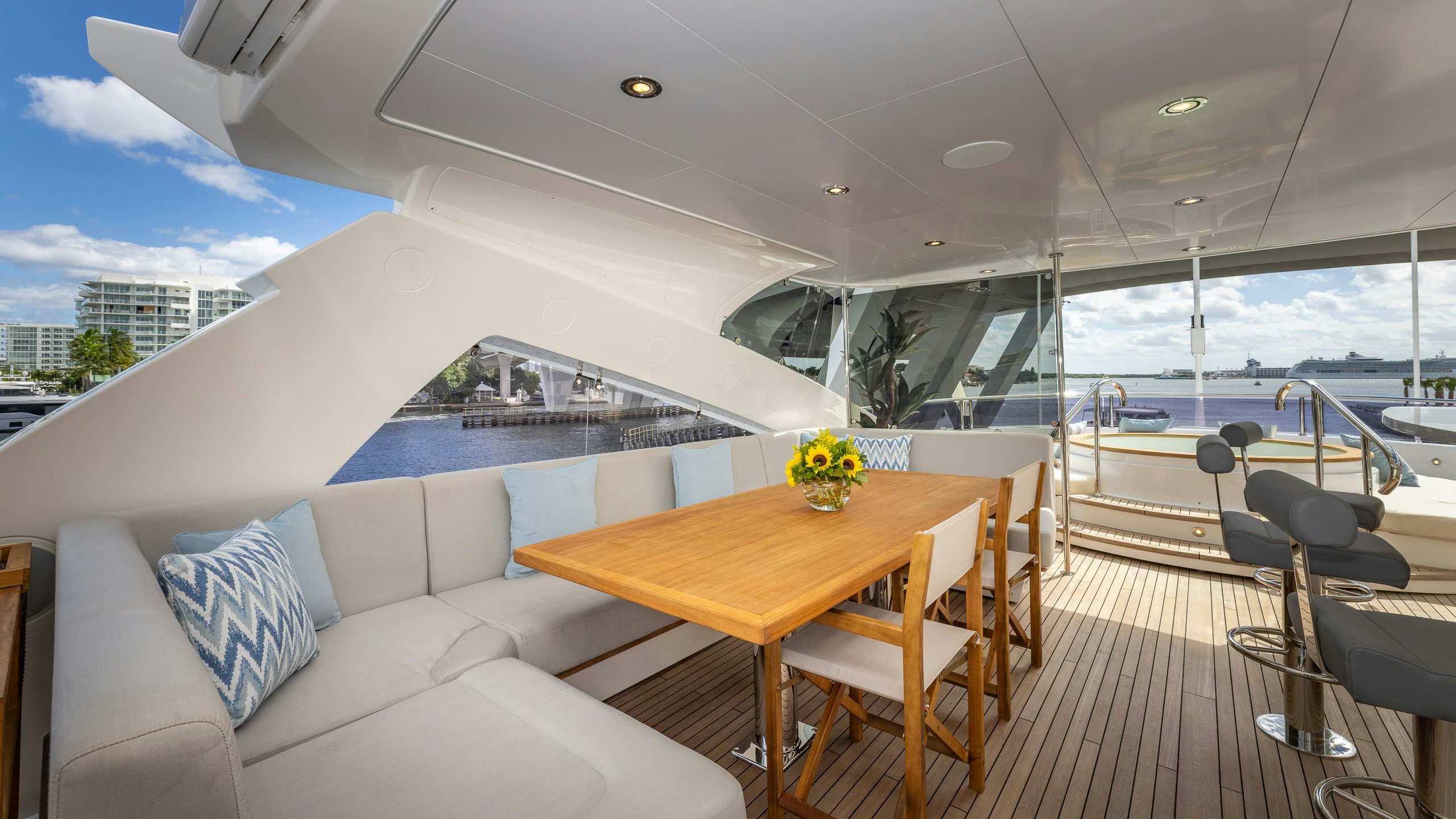 a room with a table and chairs aboard CAPTAIN MORGAN III Yacht for Charter