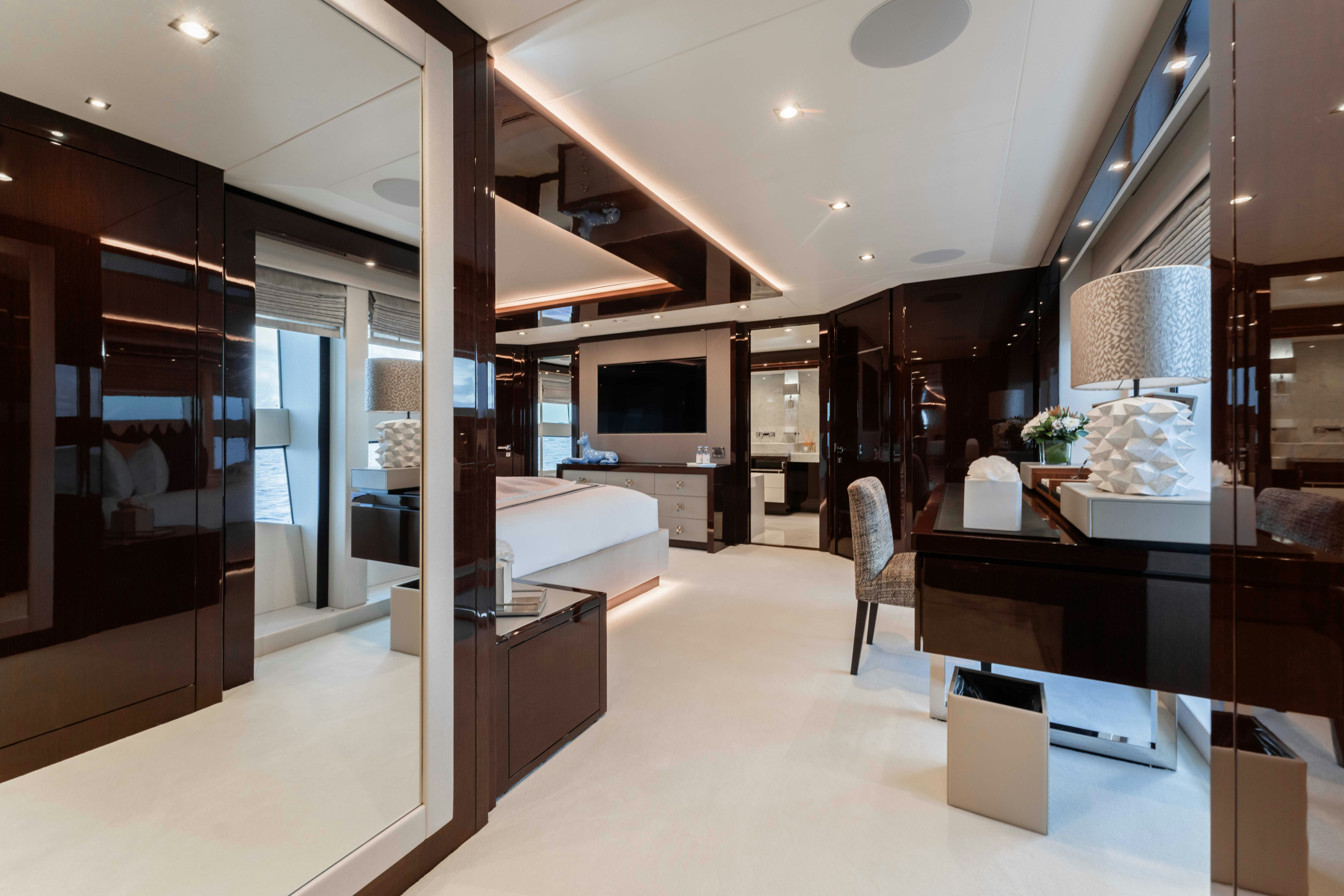 a room with a large glass door aboard CAPTAIN MORGAN III Yacht for Charter