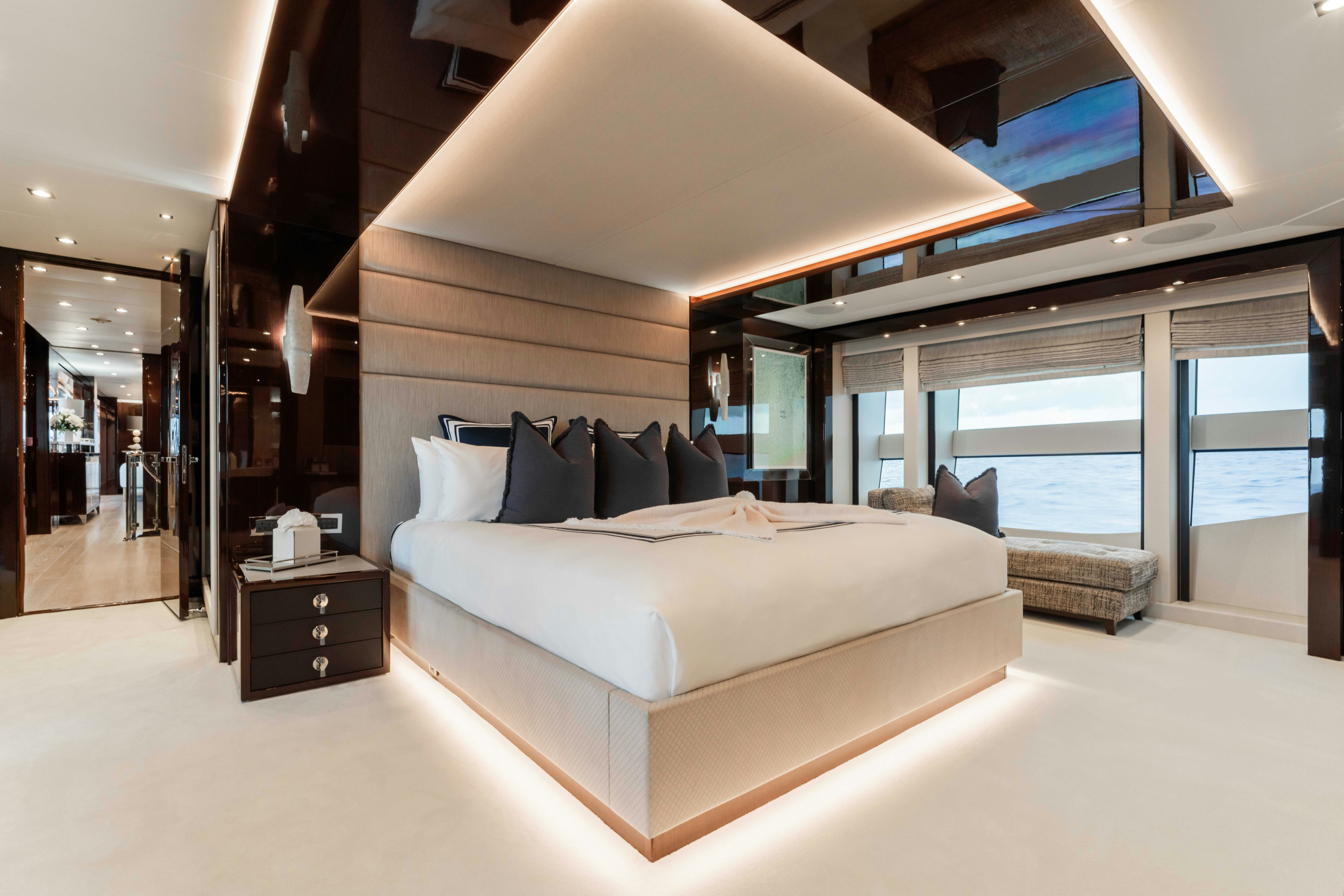 a large bed in a room aboard CAPTAIN MORGAN III Yacht for Charter