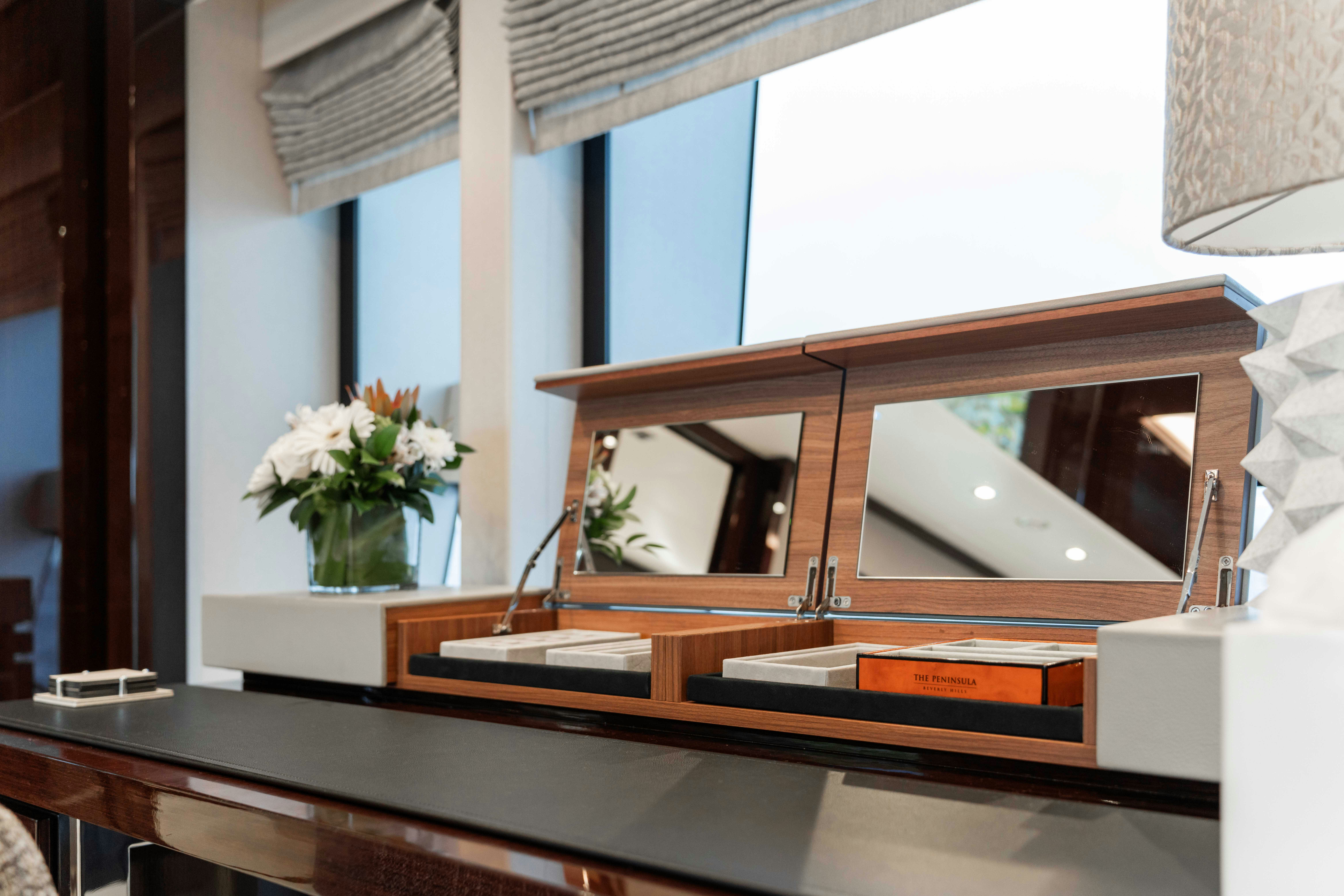 a vase of flowers sits on a table aboard CAPTAIN MORGAN III Yacht for Charter
