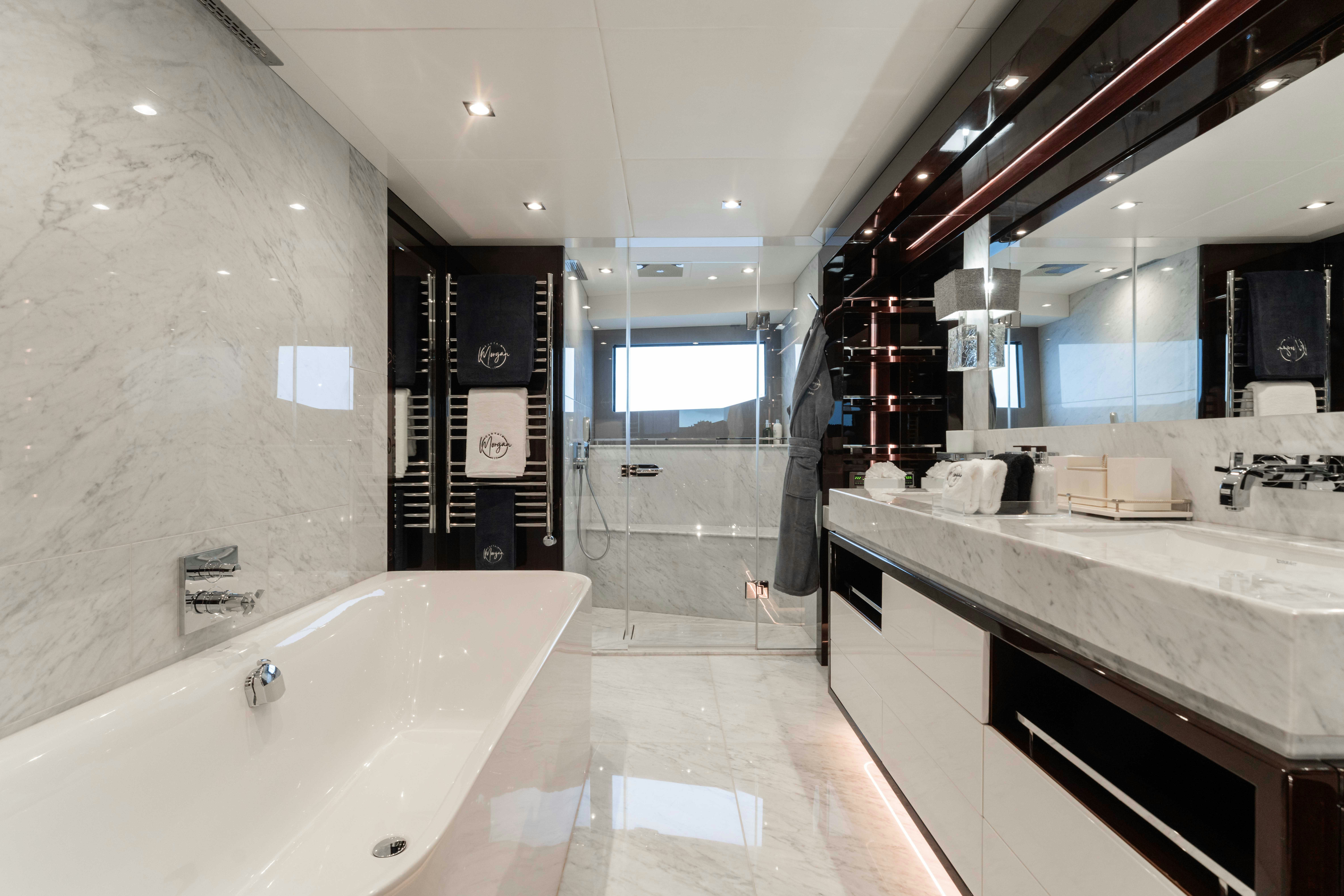 a bathroom with a large tub aboard CAPTAIN MORGAN III Yacht for Charter