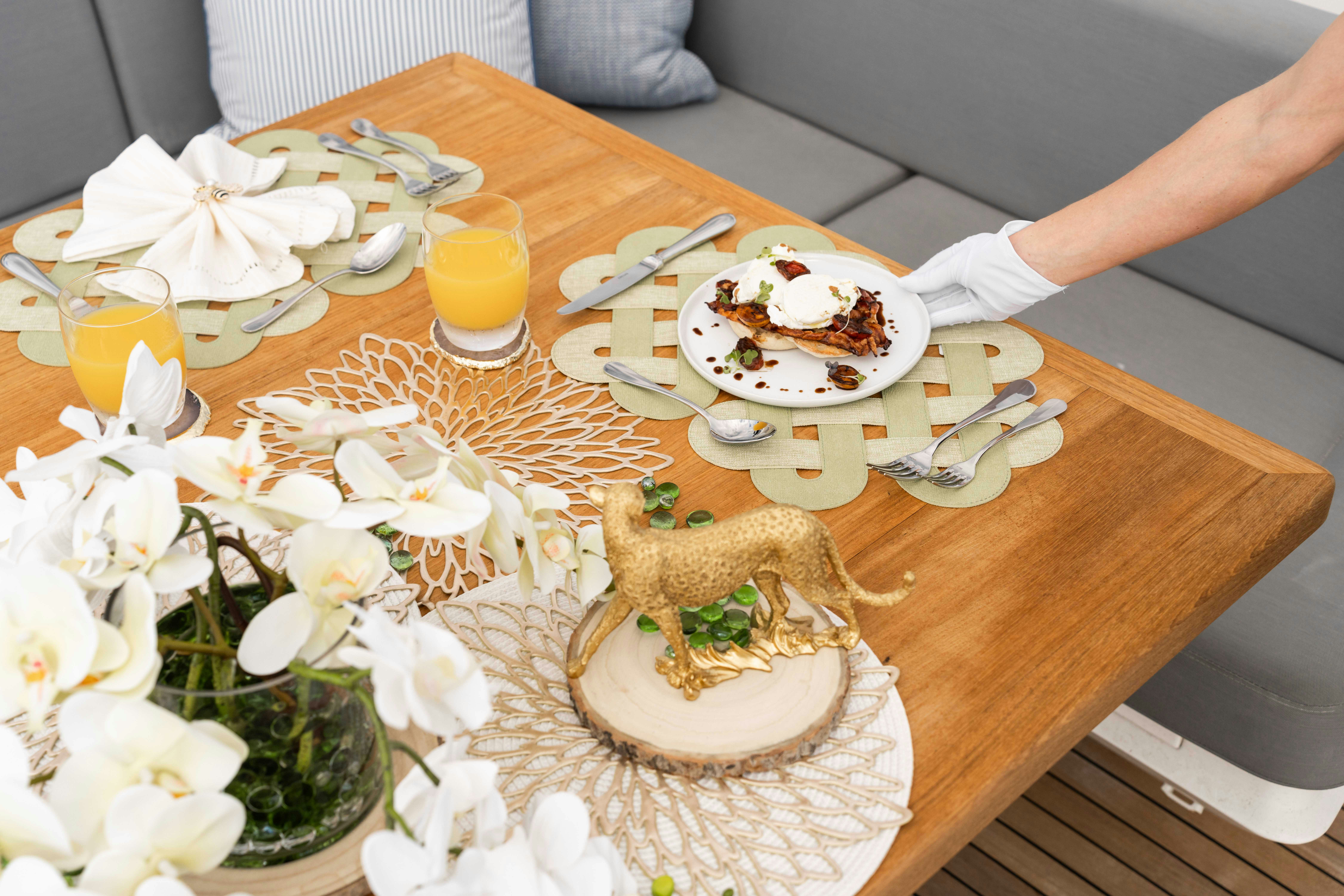 a bird on a table aboard CAPTAIN MORGAN III Yacht for Charter