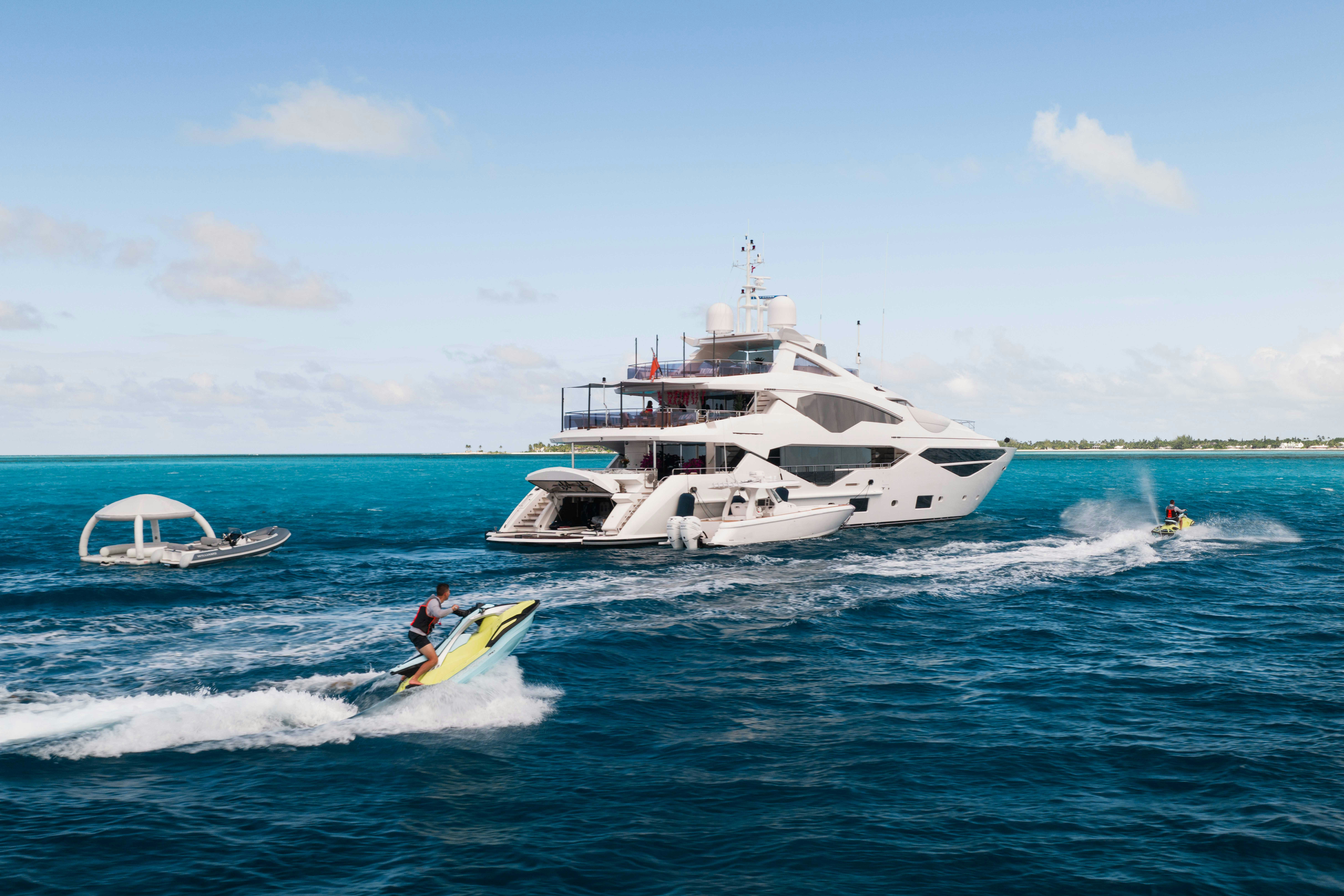a boat and a person on the water aboard CAPTAIN MORGAN III Yacht for Charter
