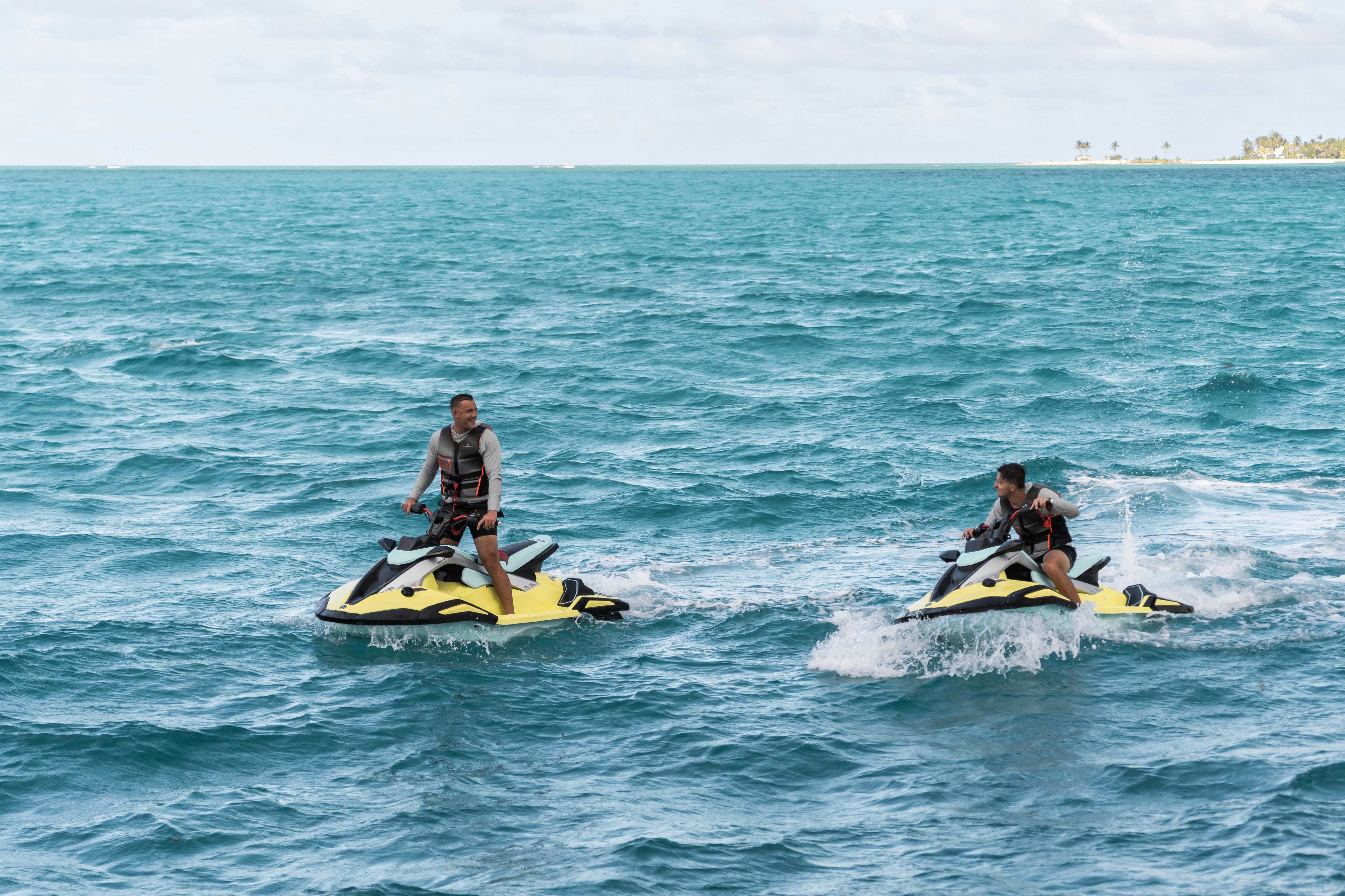 a group of people on canoes in the water aboard CAPTAIN MORGAN III Yacht for Charter