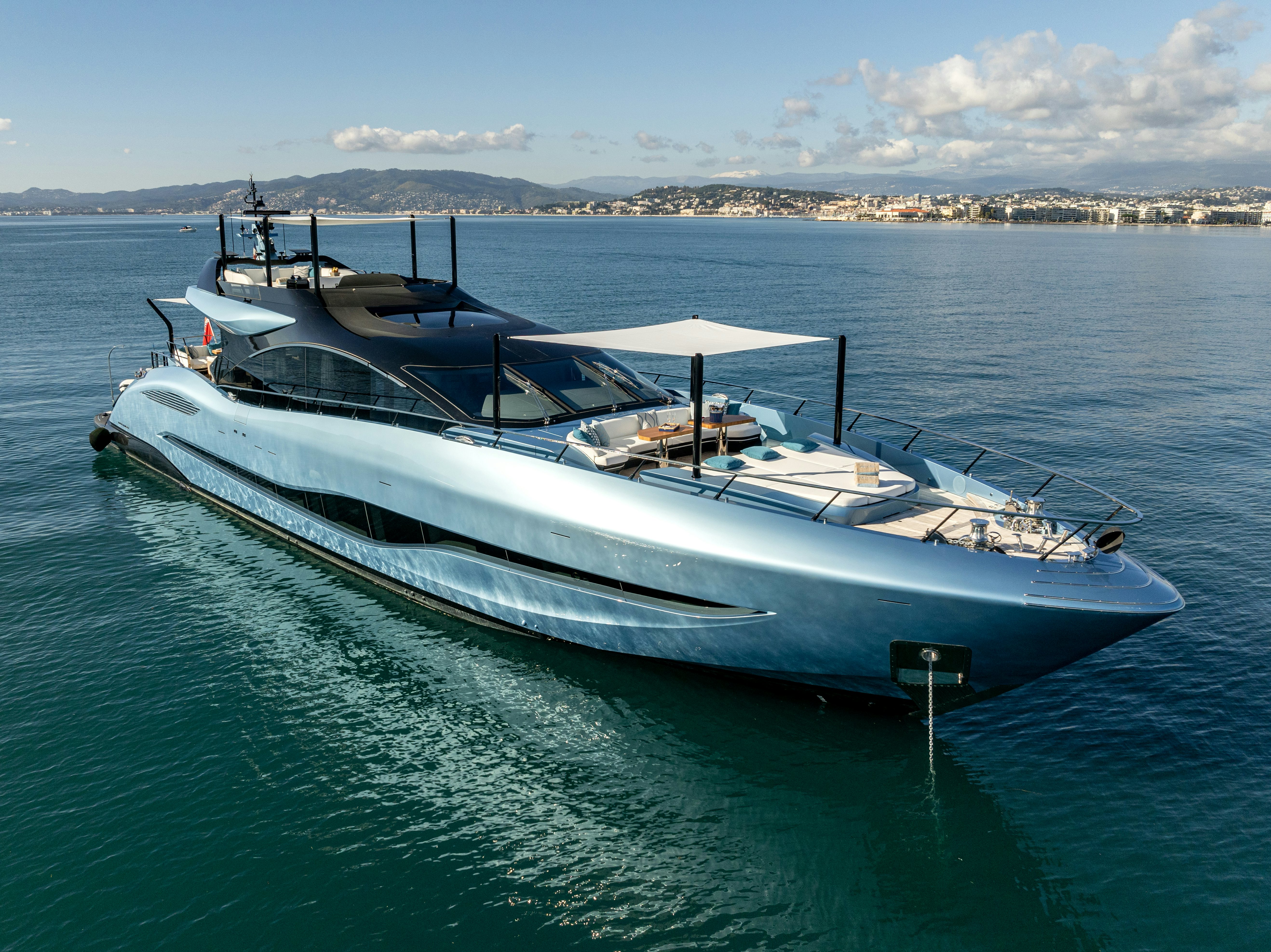 a white yacht in the water aboard DELFINA Yacht for Sale