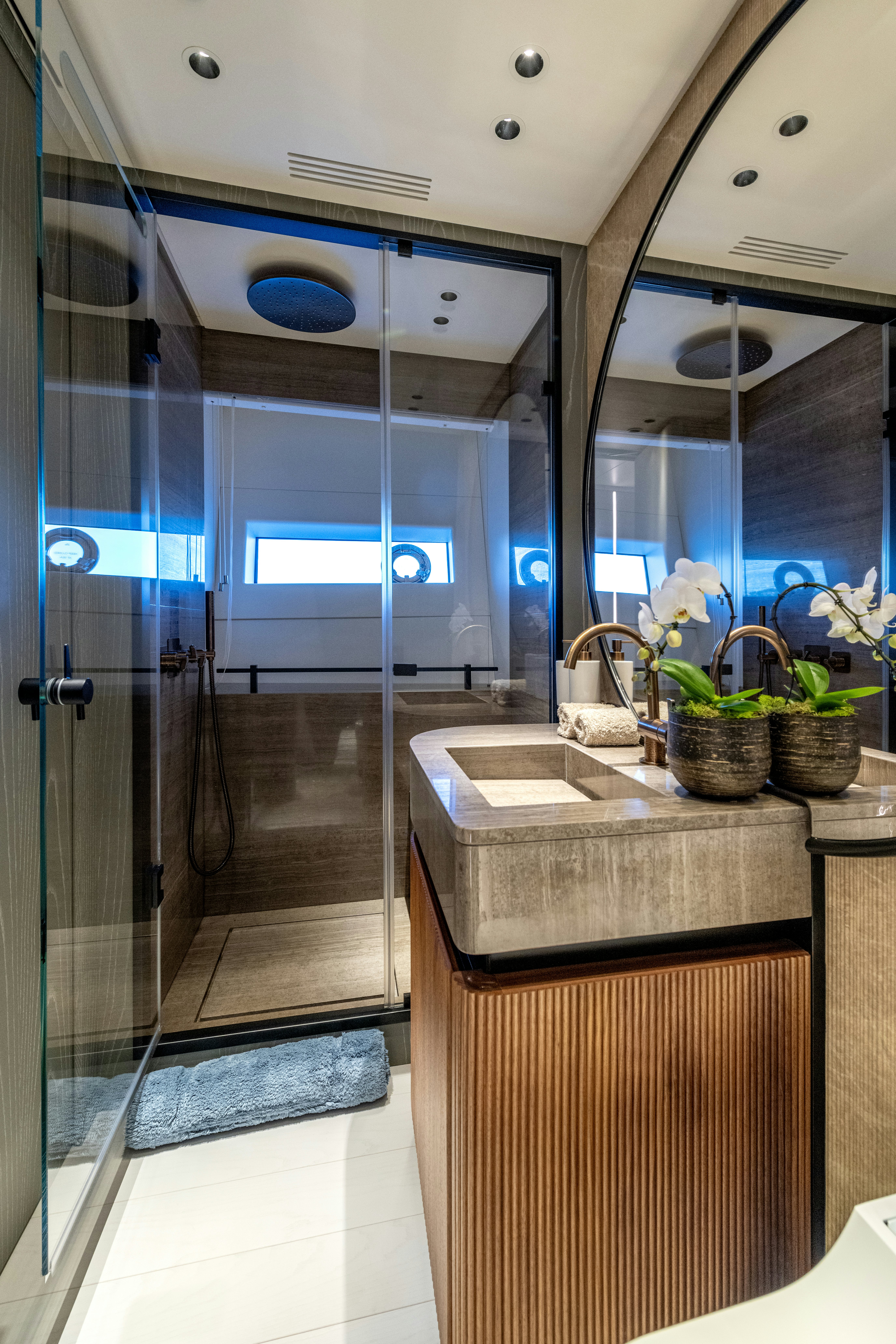 a bathroom with a sink and a mirror aboard DELFINA Yacht for Sale