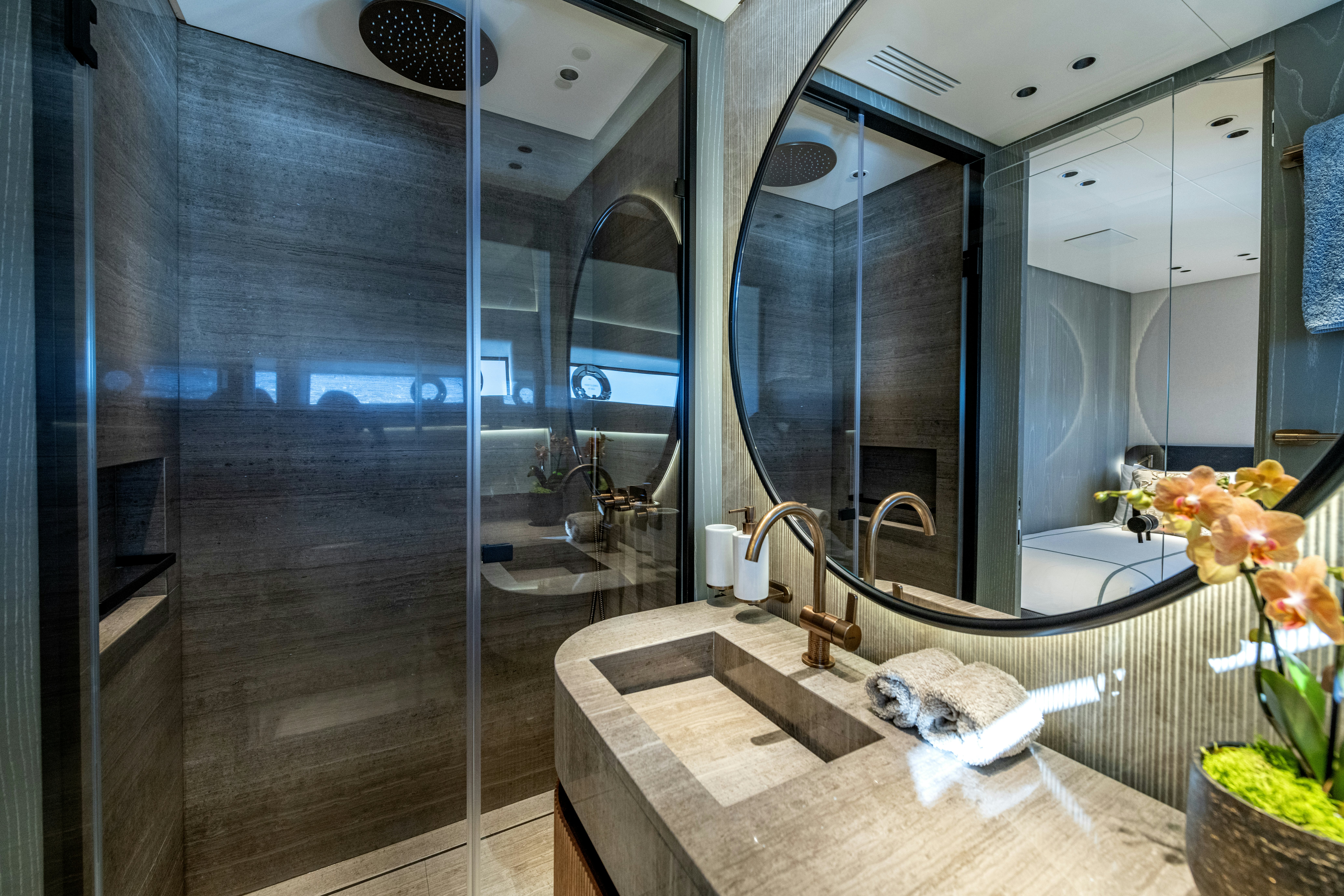a bathroom with a large mirror aboard DELFINA Yacht for Sale