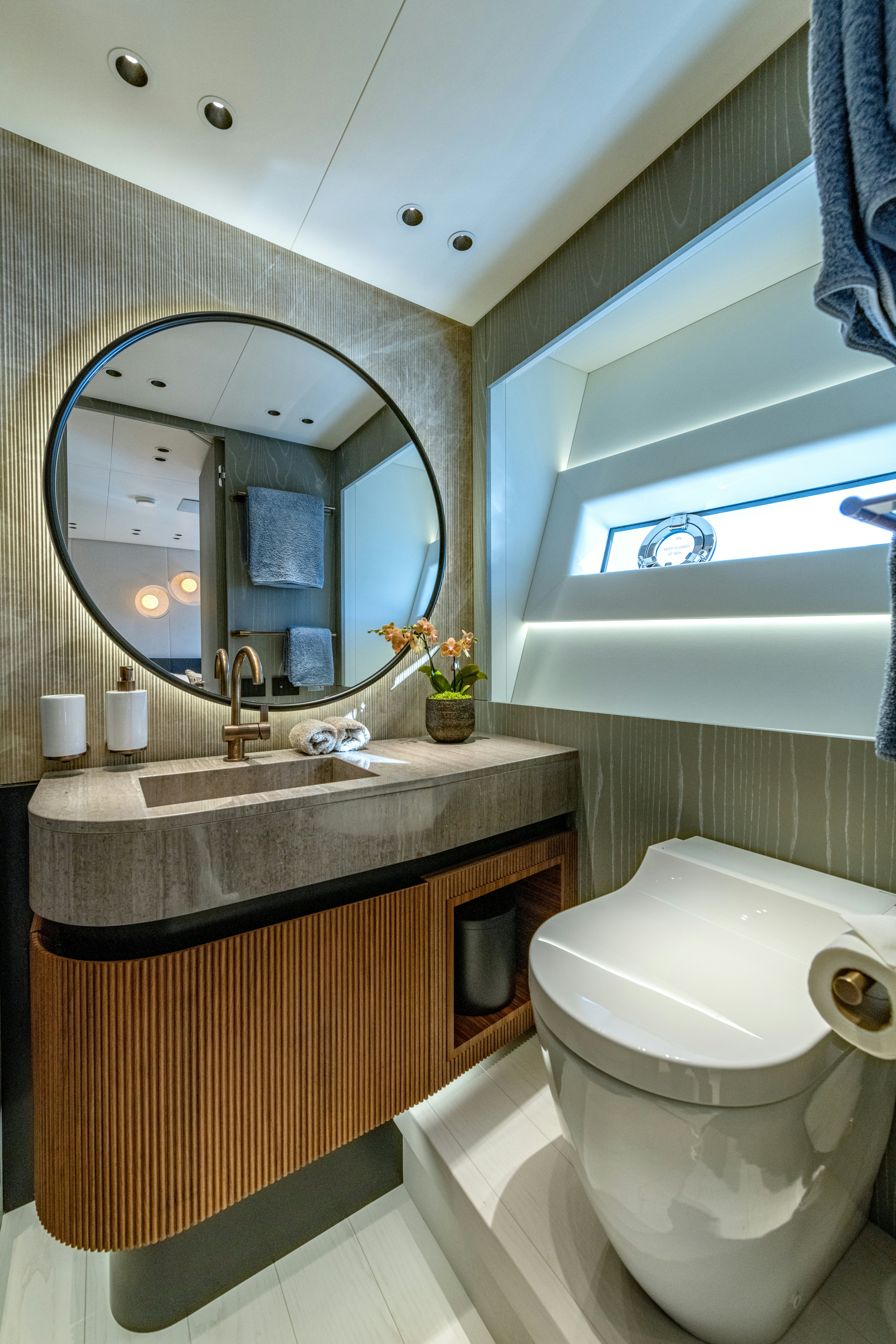a bathroom with a large mirror aboard DELFINA Yacht for Sale