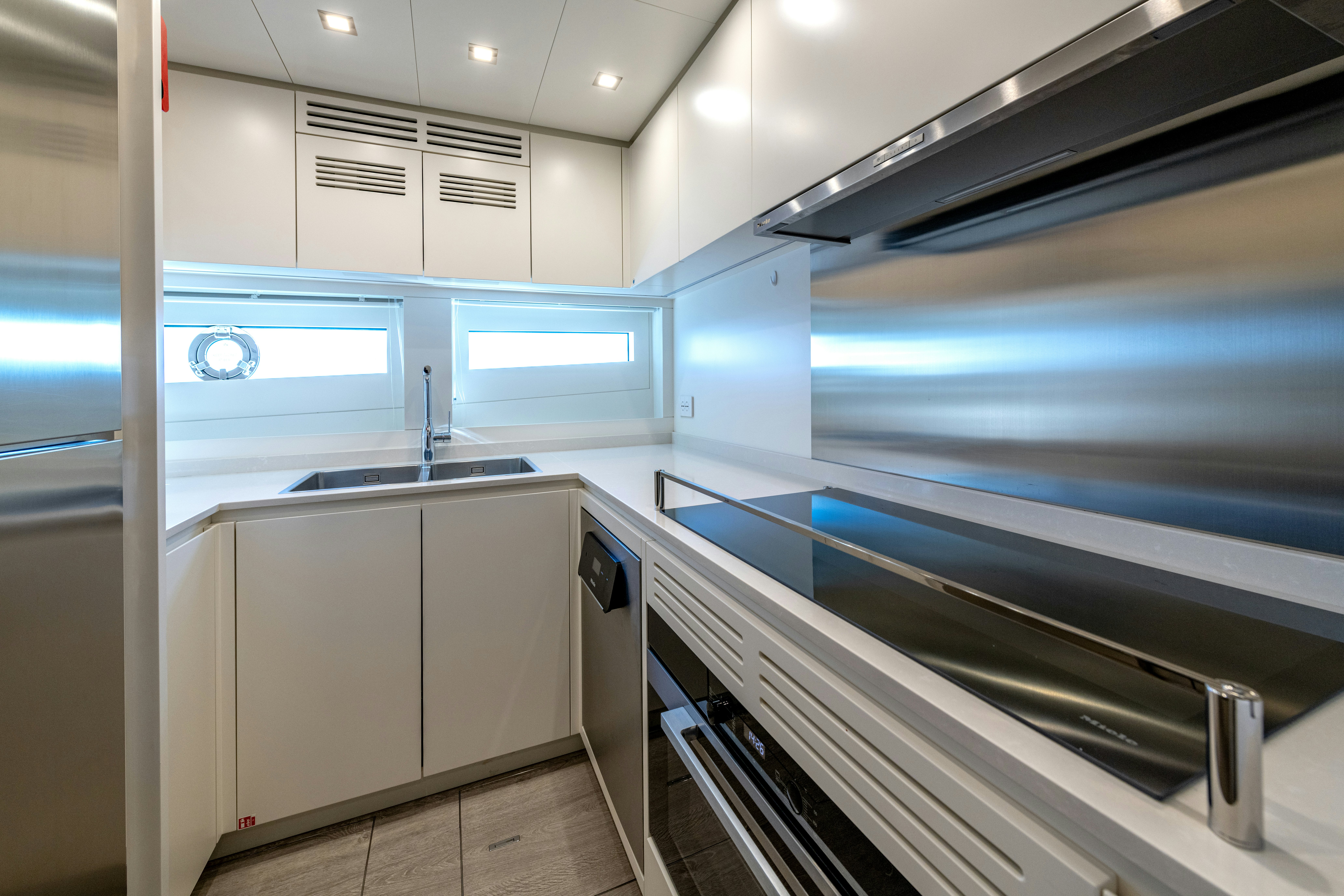 a kitchen with a large oven aboard DELFINA Yacht for Sale