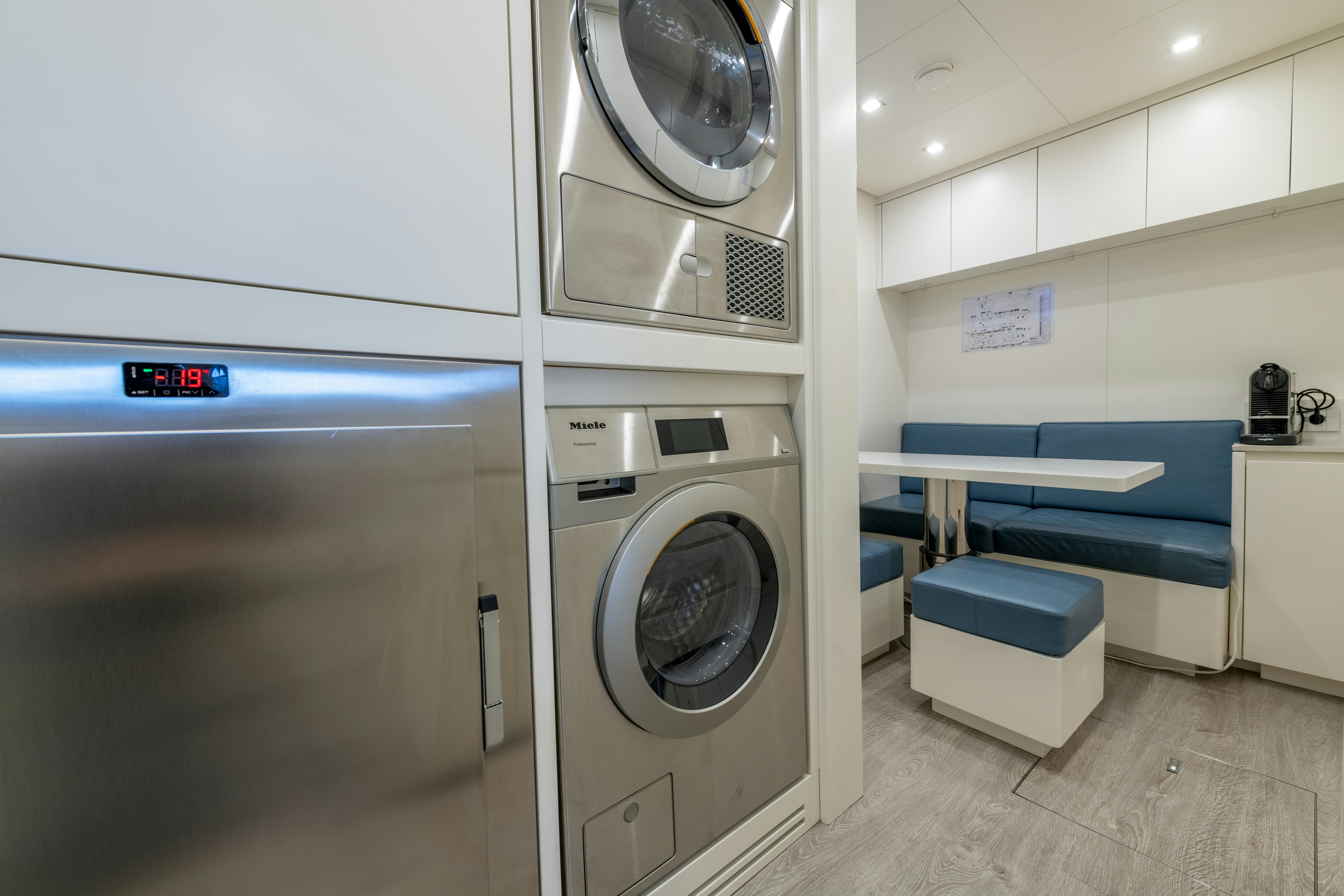 a room with a washer and dryer aboard DELFINA Yacht for Sale