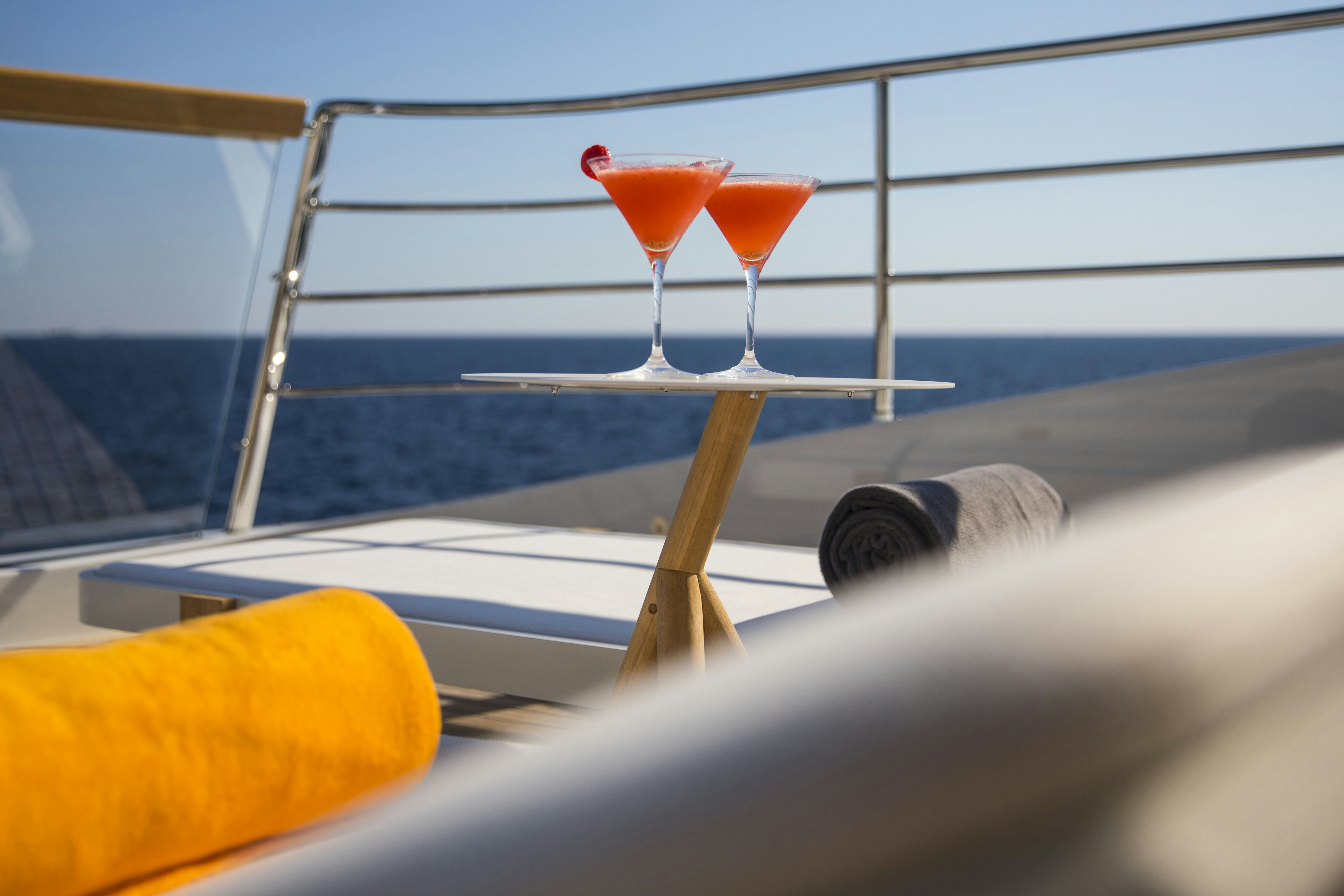 two drinks on a table aboard MOKA Yacht for Charter