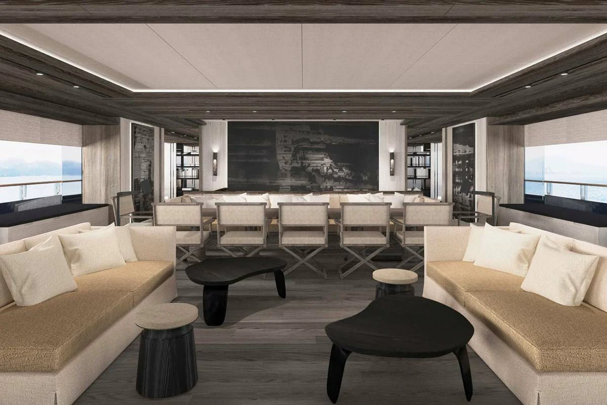 a room with a couch and a table and chairs aboard LES CINQ Yacht for Sale