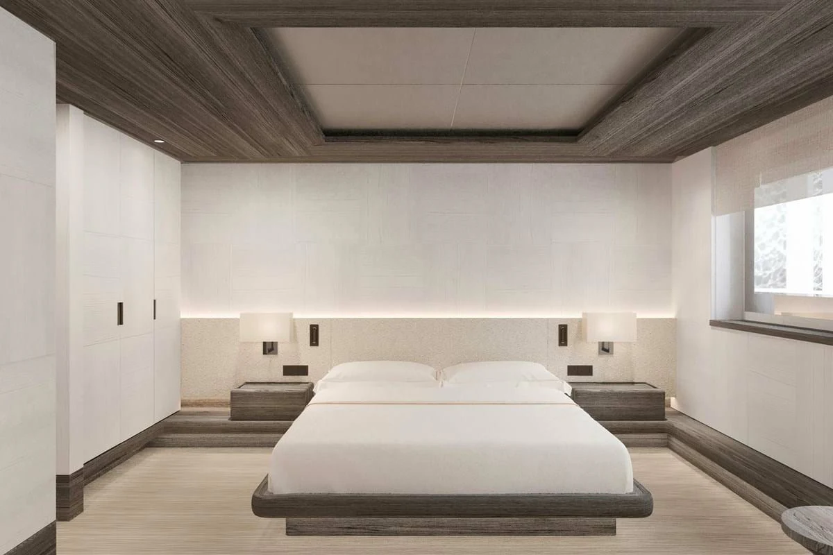 a large bedroom with a large bed aboard LES CINQ Yacht for Sale