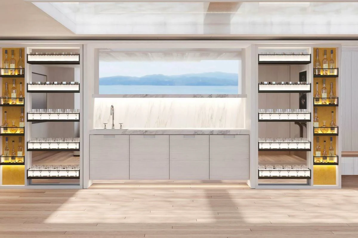a room with shelves and shelves aboard LES CINQ Yacht for Charter