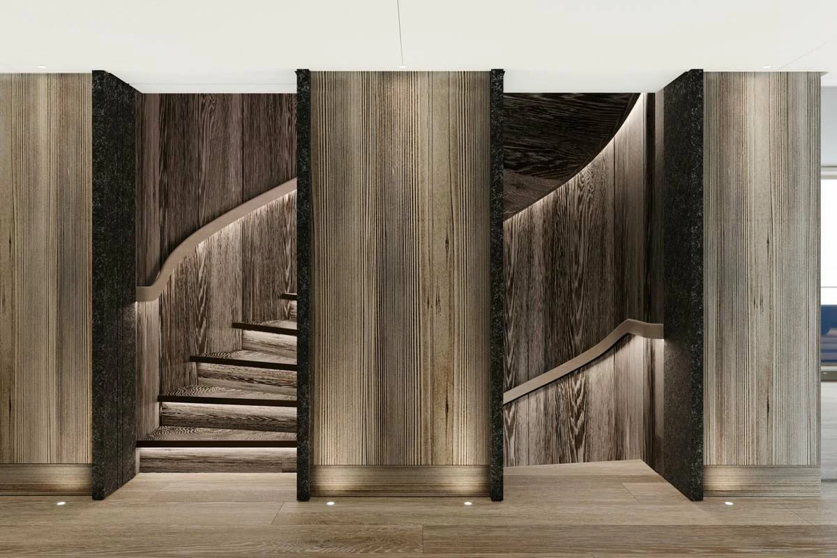 a staircase with a wood railing aboard LES CINQ Yacht for Charter