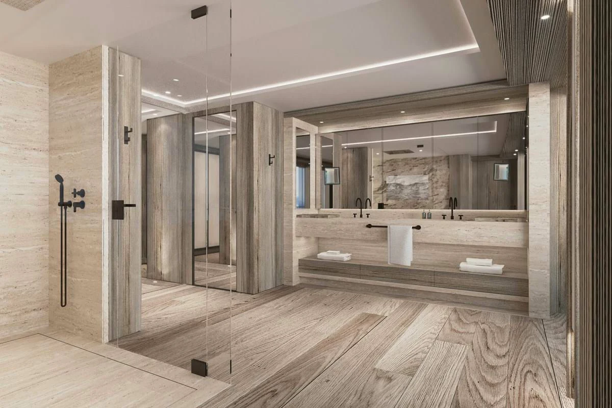 a large bathroom with a large mirror aboard LES CINQ Yacht for Charter