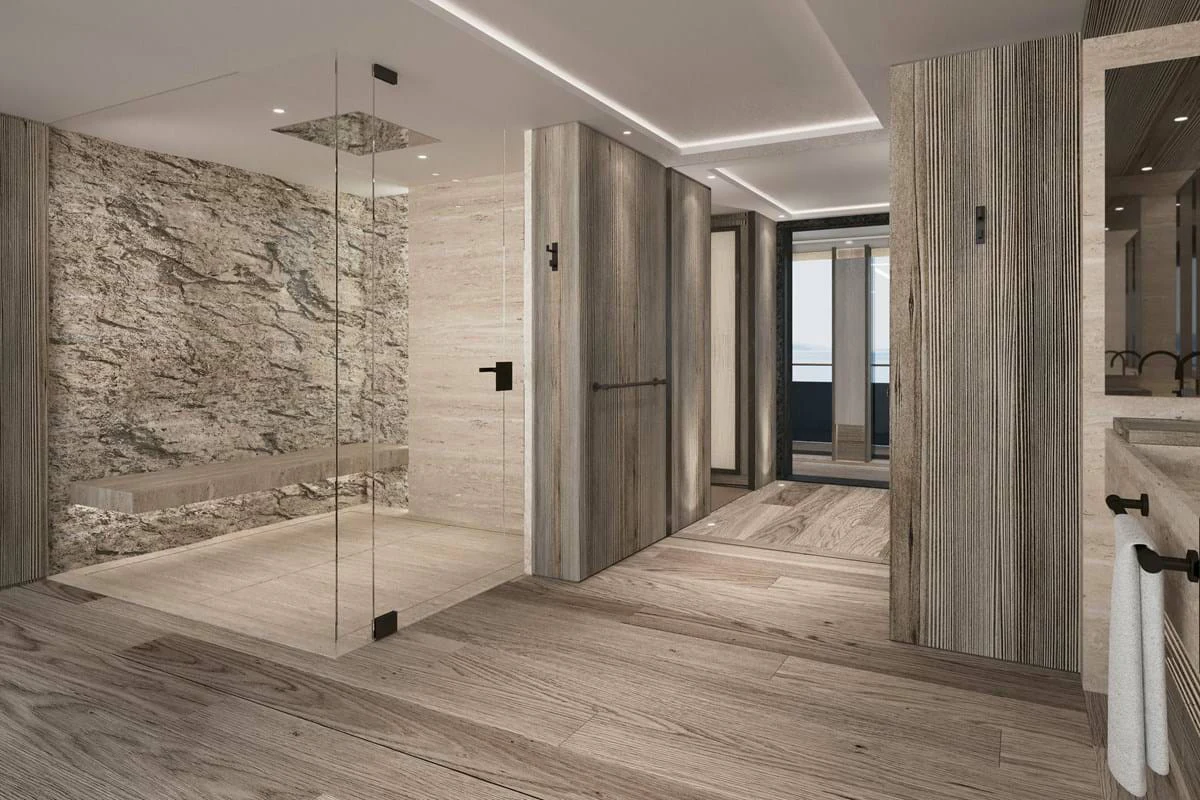 a large bathroom with a large shower aboard LES CINQ Yacht for Charter