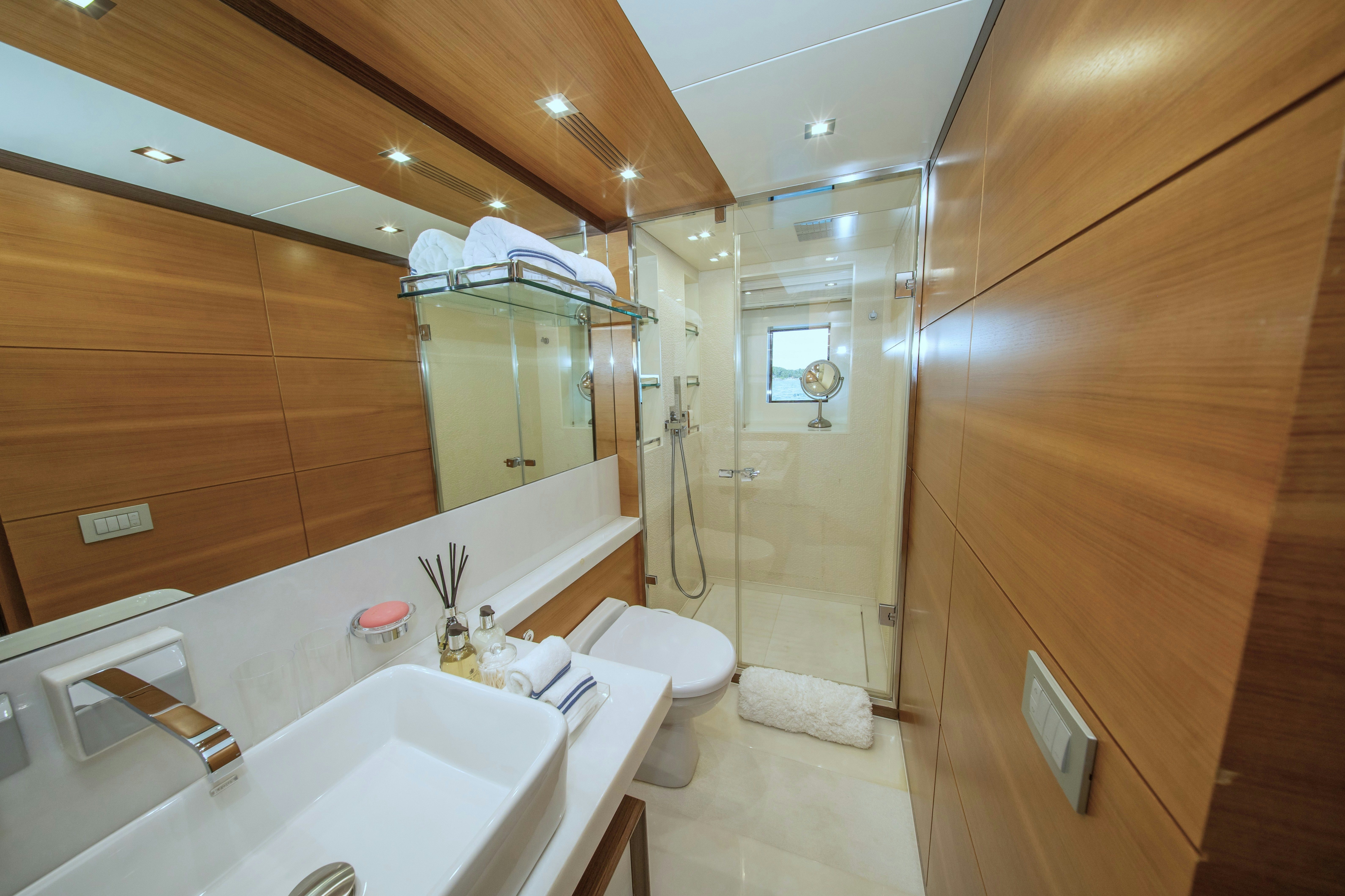 a bathroom with a sink and a shower aboard REHAB Yacht for Sale