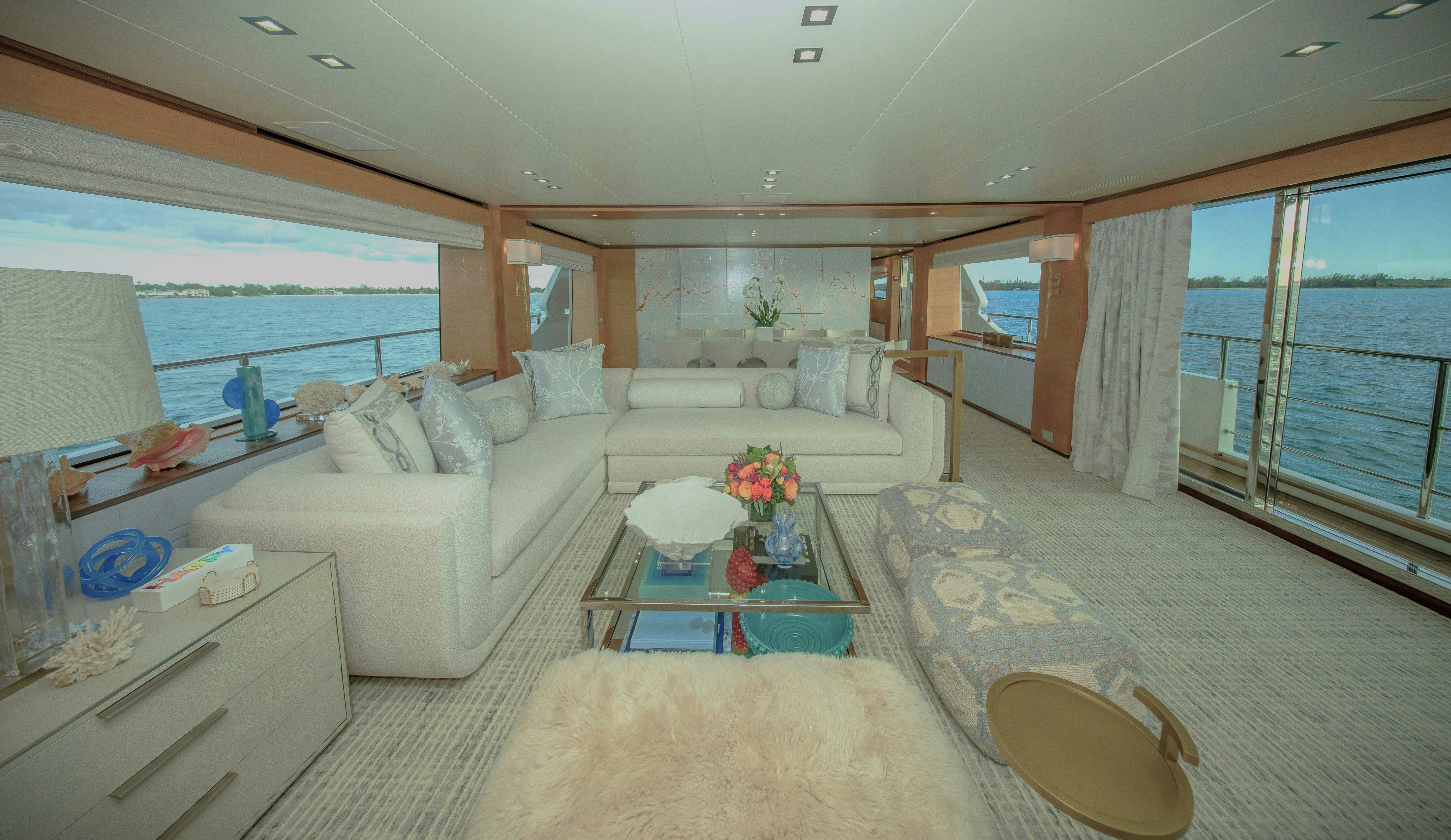 a living room with a large window aboard REHAB Yacht for Sale