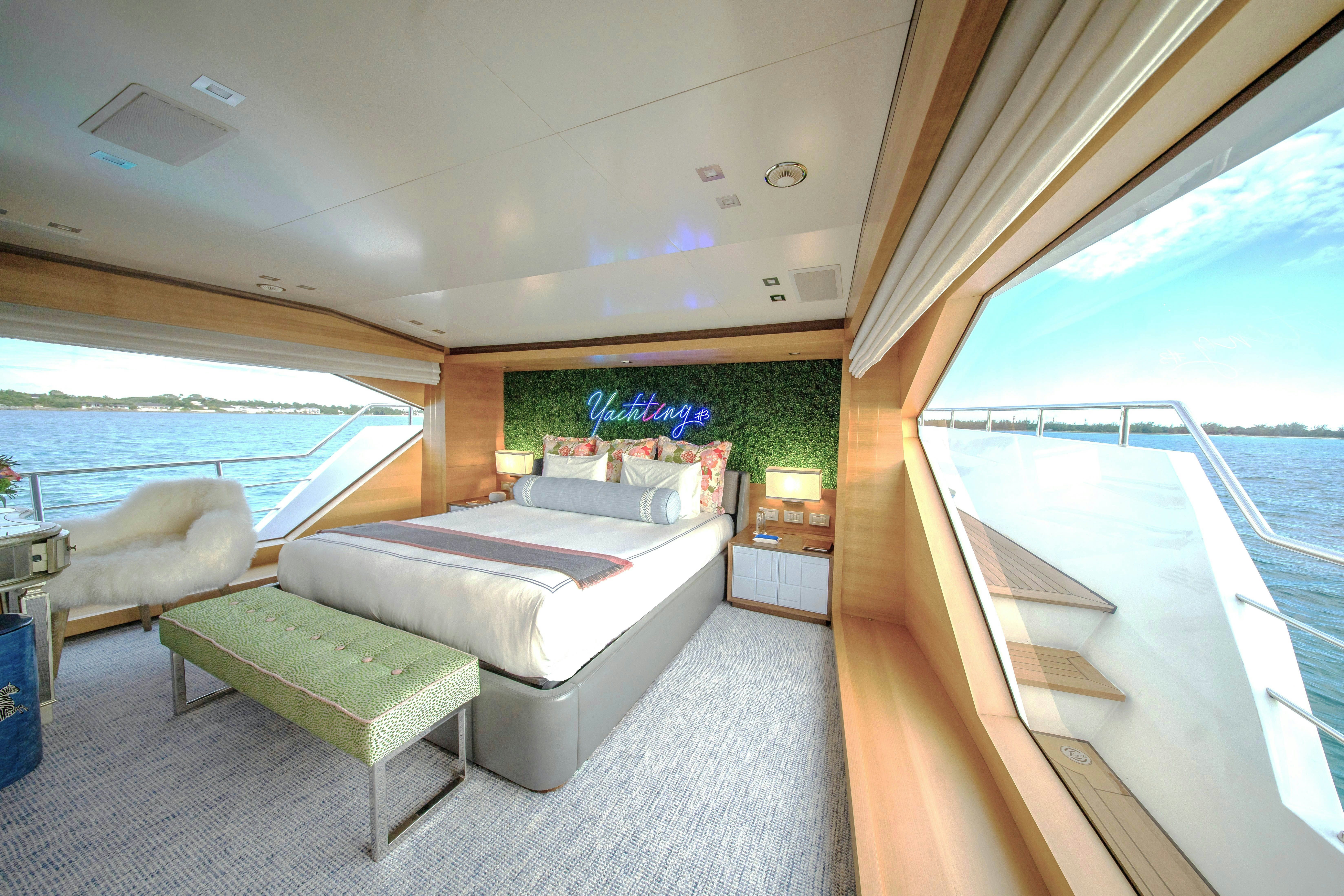 a living room with a couch and a pool aboard REHAB Yacht for Sale