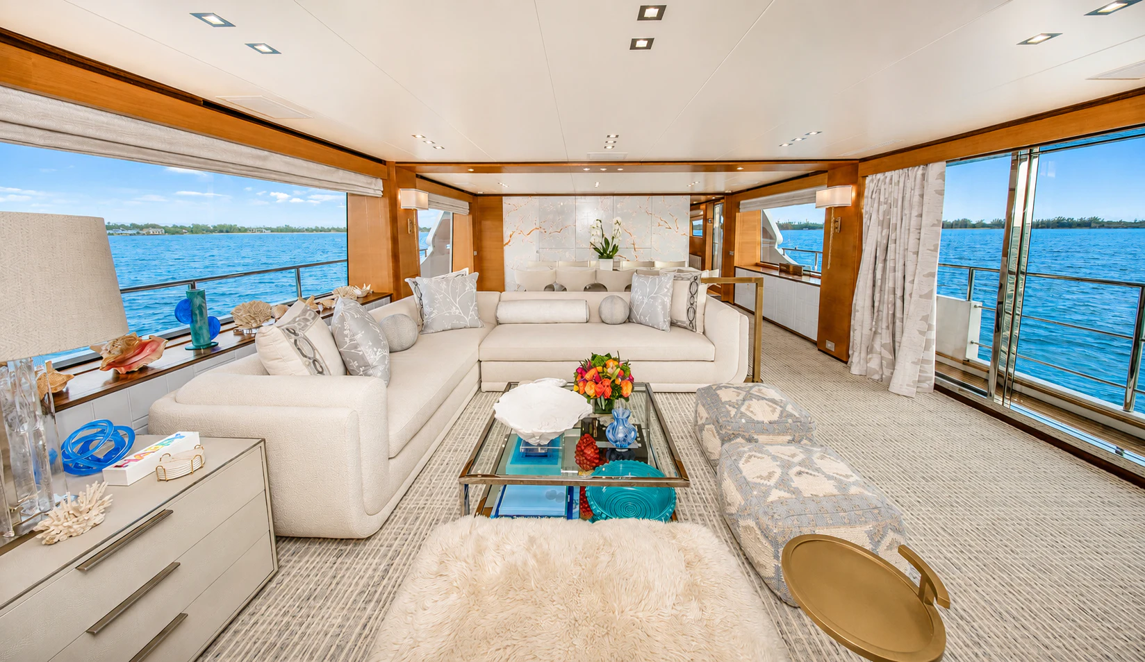 a living room with a large window aboard REHAB Yacht for Sale